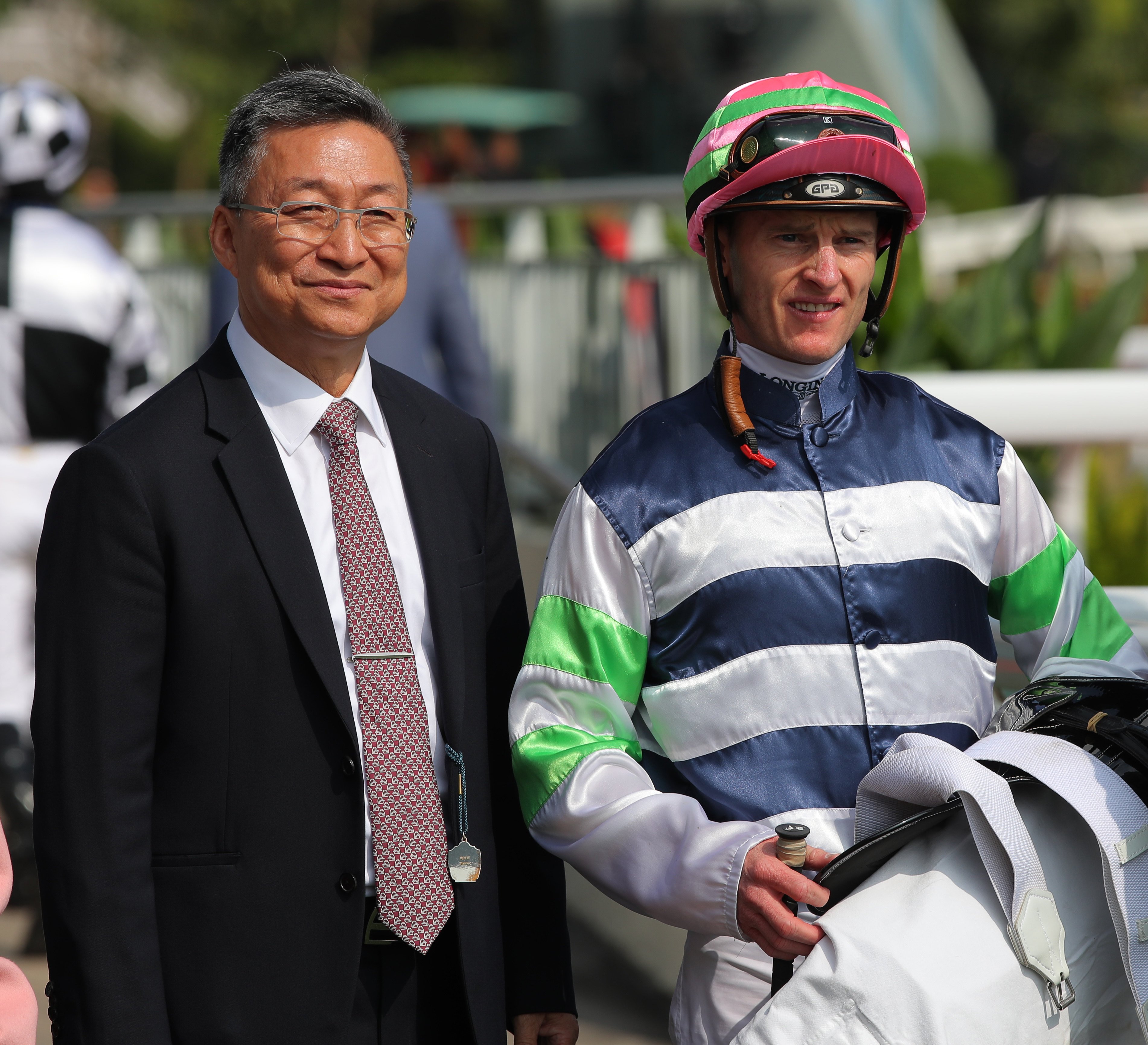 Trainer Francis Lui celebrates Packing Angel’s dominant Sha Tin win with jockey Zac Purton. Photos: Kenneth Chan