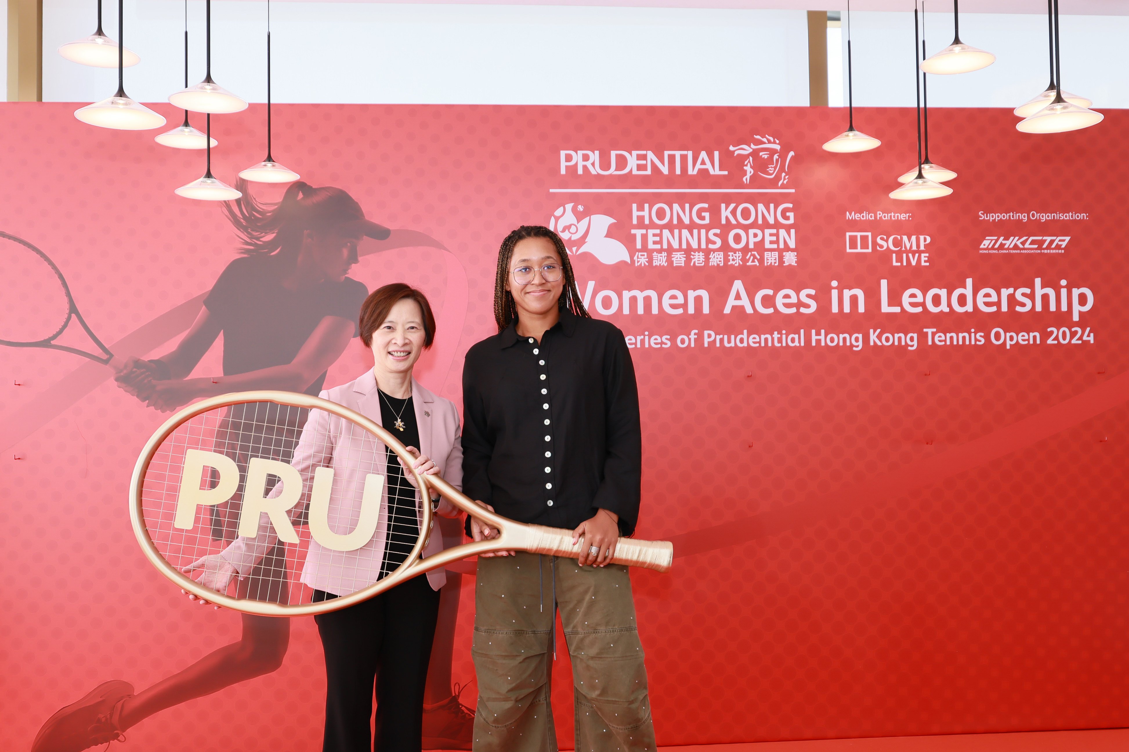 Angel Ng (left), regional CEO for Greater China, customer and wealth, at Prudential Group, with four-time tennis Grand Slam champion Naomi Osaka.
