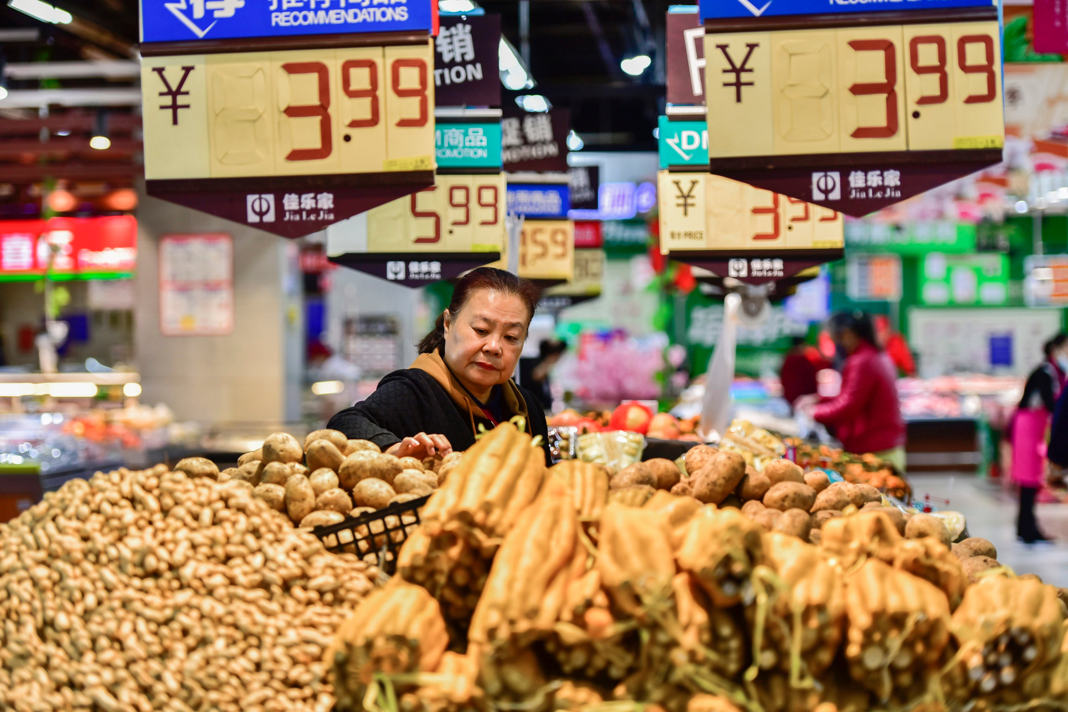 Consumers shop at a supermarket in Qingzhou city in eastern China’s Shandong province. Photo: CFOTO/Future Publishing via Getty Images