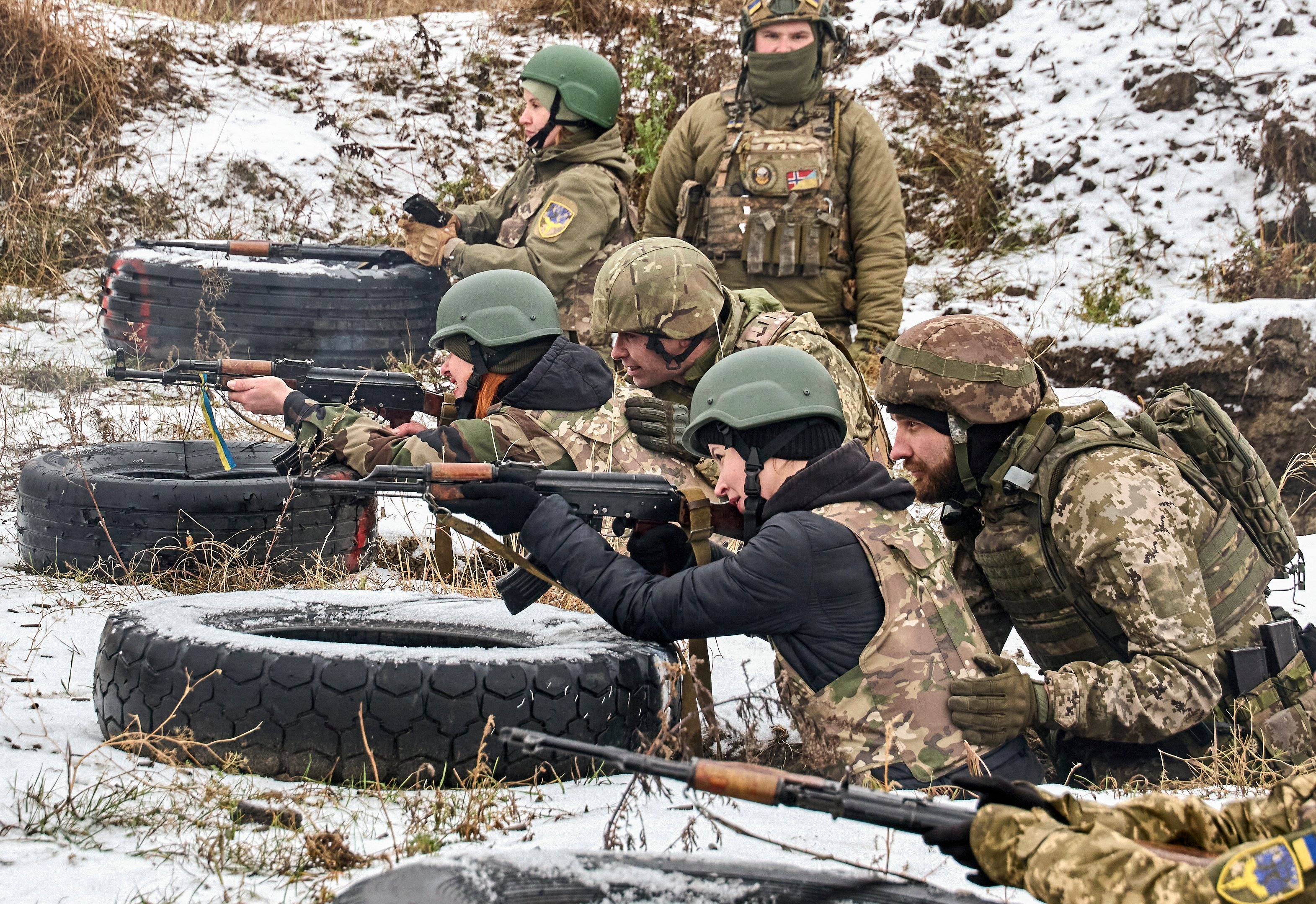 Ukrainian civilians take part in military training on a shooting range in the Kharkiv region, Ukraine, on Saturday. Photo: EPA-EFE