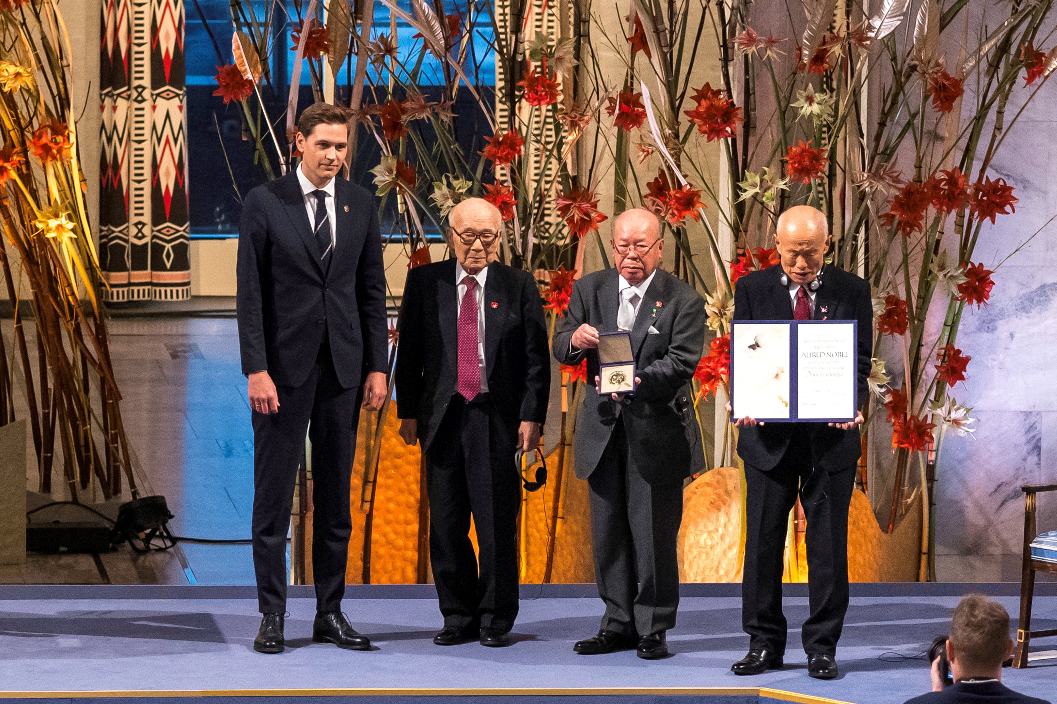 Representatives of 2024 Nobel Peace Prize winner Nihon Hidankyo, Terumi Tanaka, Shigemitsu Tanaka and Toshiyuki Mimaki attend the Nobel Peace Prize ceremony in Oslo, Norway on December 10. Photo: Reuters.