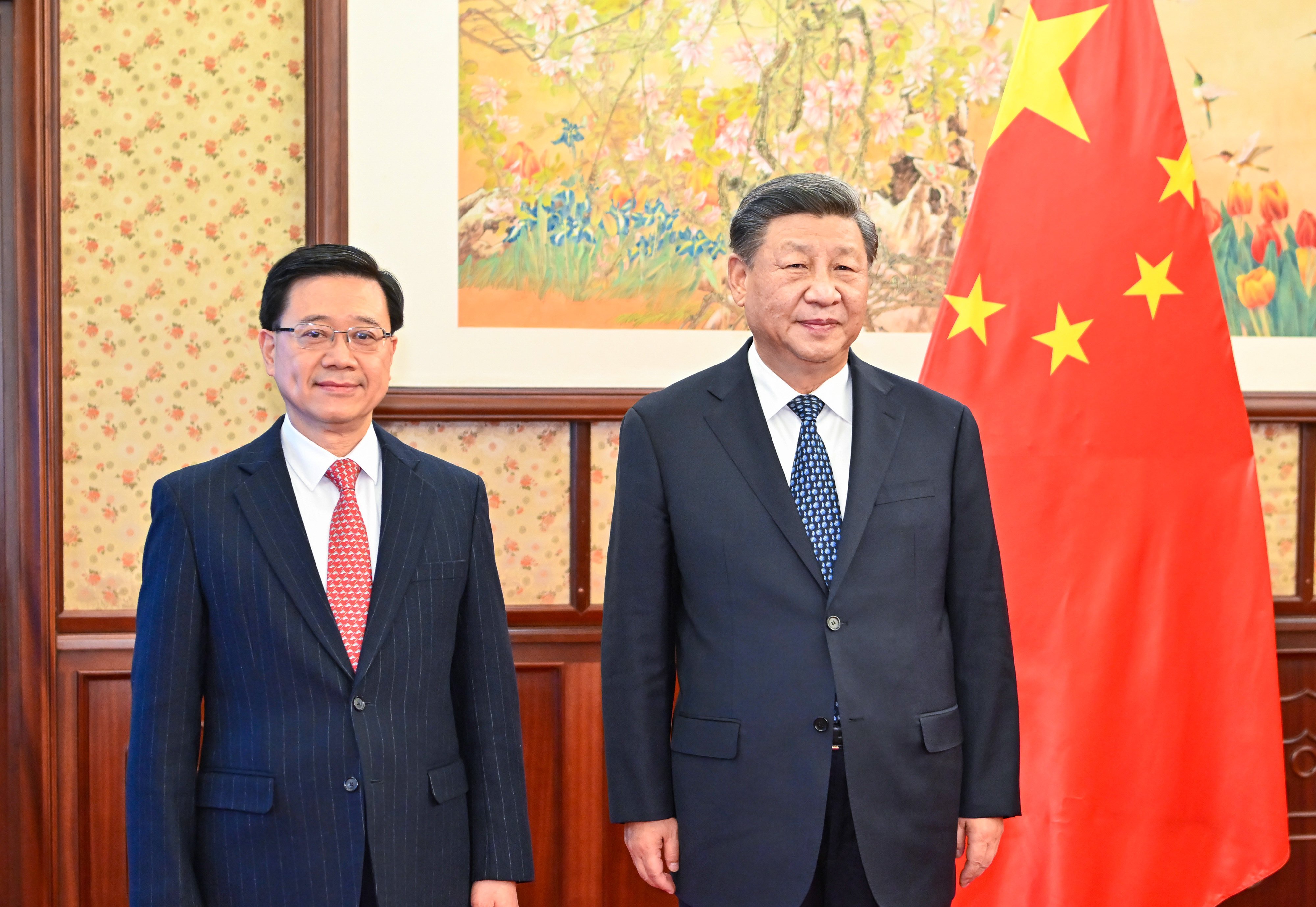 Chief Executive John Lee (left) and President Xi Jinping meet in 2022. Photo: Xinhua