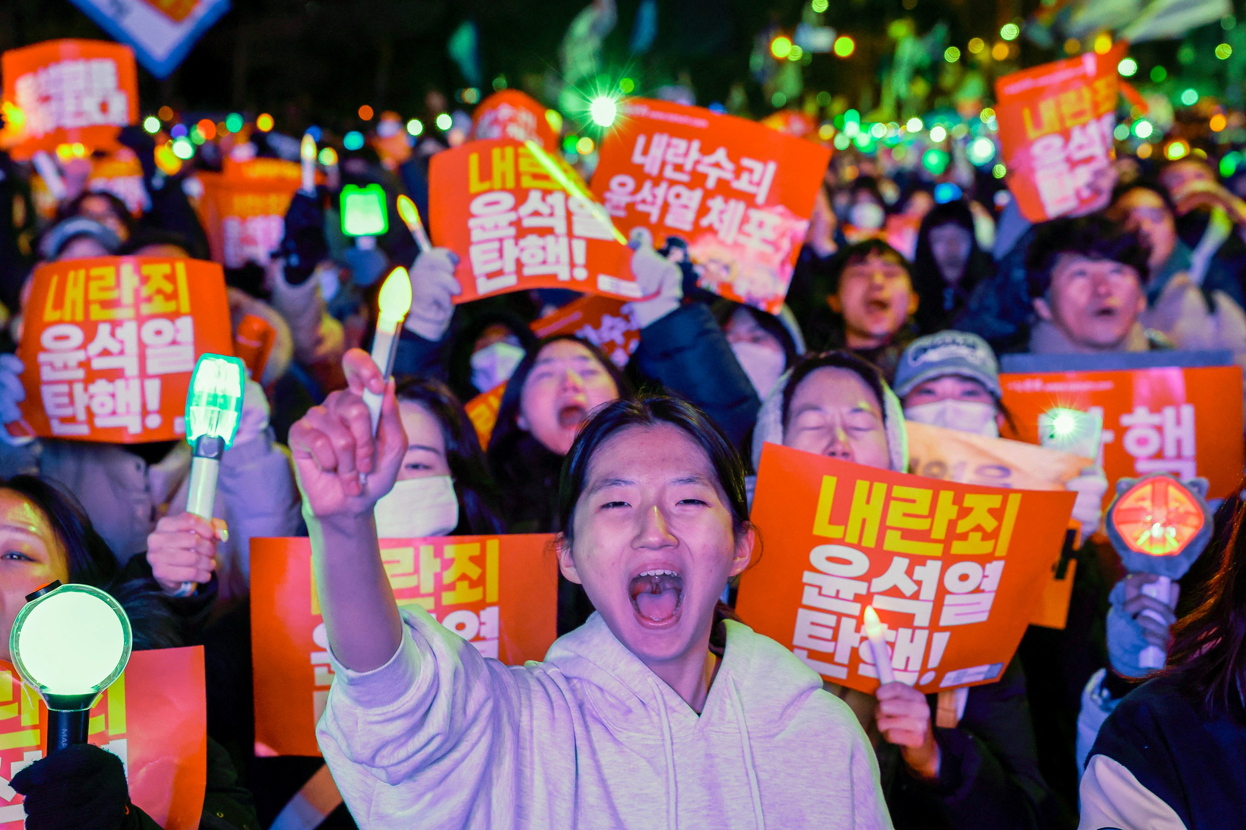 Protesters call for the impeachment of South Korean President Yoon Suk-yeol, after his botched attempt to impose martial law, in front of the national assembly in Seoul on December 7. Photo: Reuters