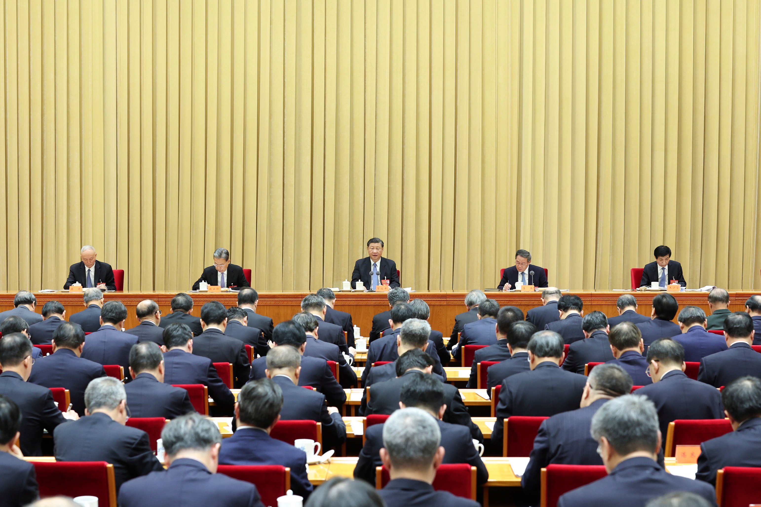 Chinese President Xi Jinping delivers a speech at the 2023 central economic work conference in Beijing. Photo: AP