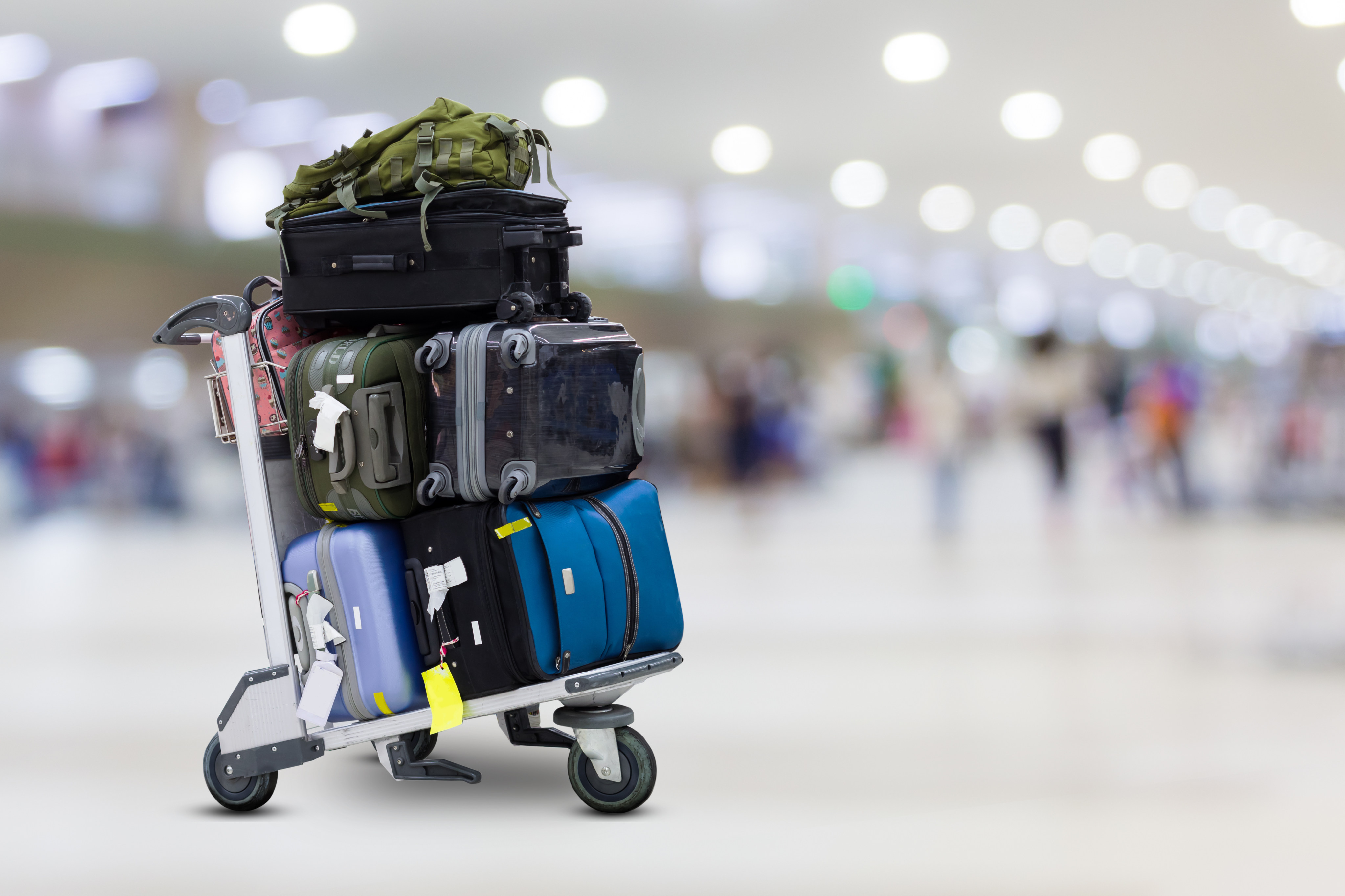 Airport luggage Trolley with suitcases: Photo: Shutterstock