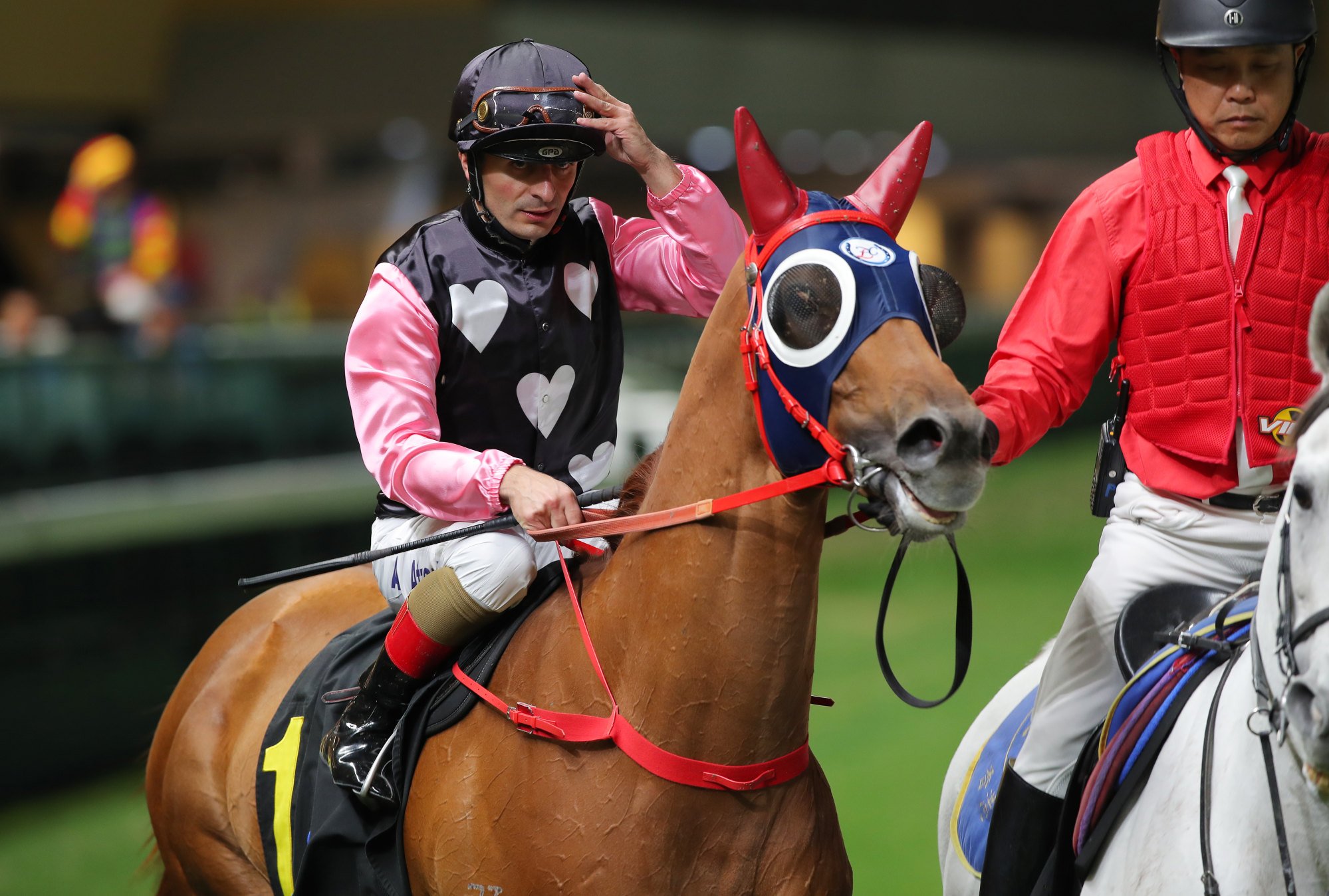 Andrea Atzeni returns to the winners’ enclosure at Happy Valley.