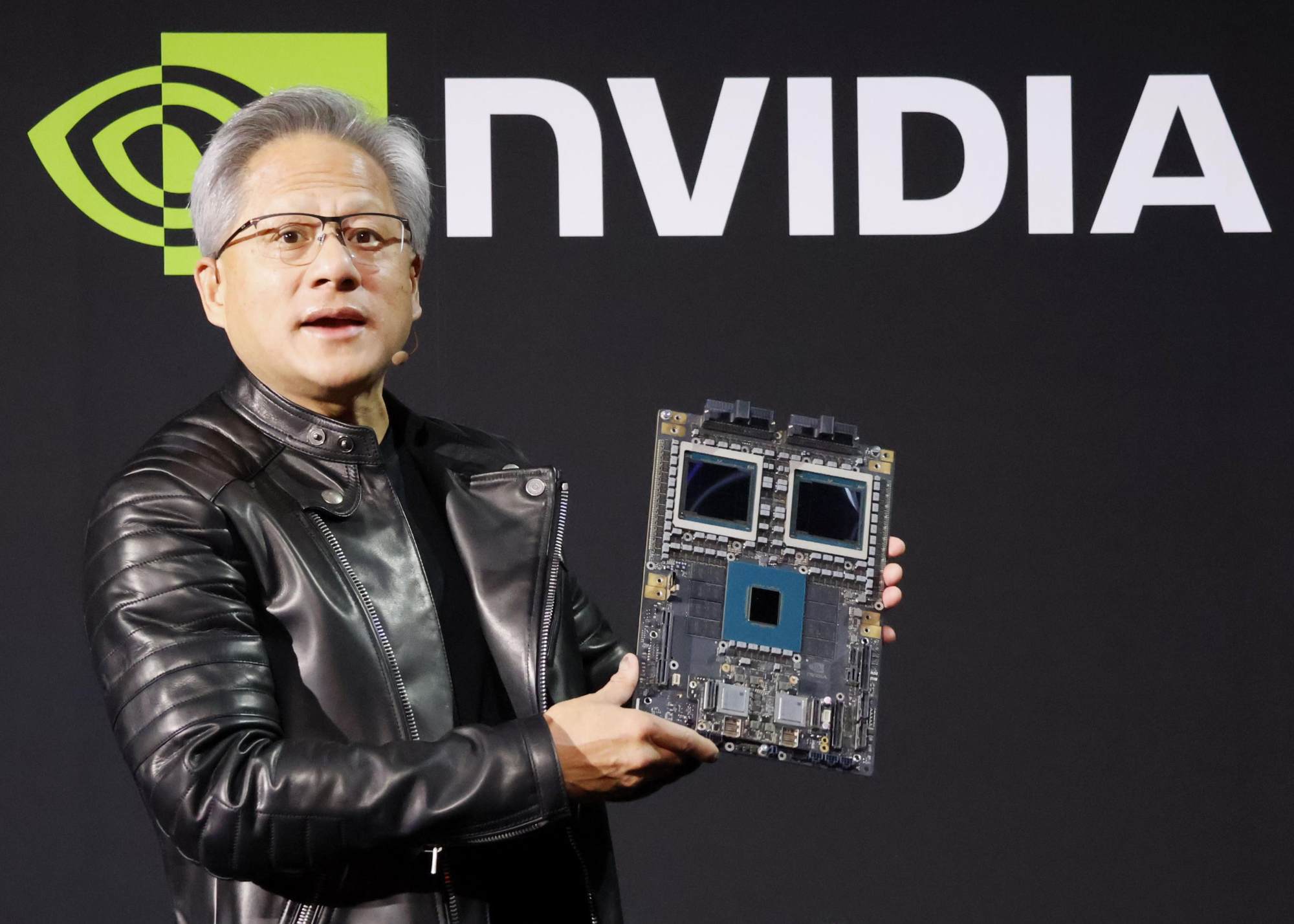 Semiconductor giant Nvidia’s founder and chief executive, Jensen Huang, delivers a speech at an event on artificial intelligence in Tokyo, Japan, on November 13, 2024. Photo: Kyodo