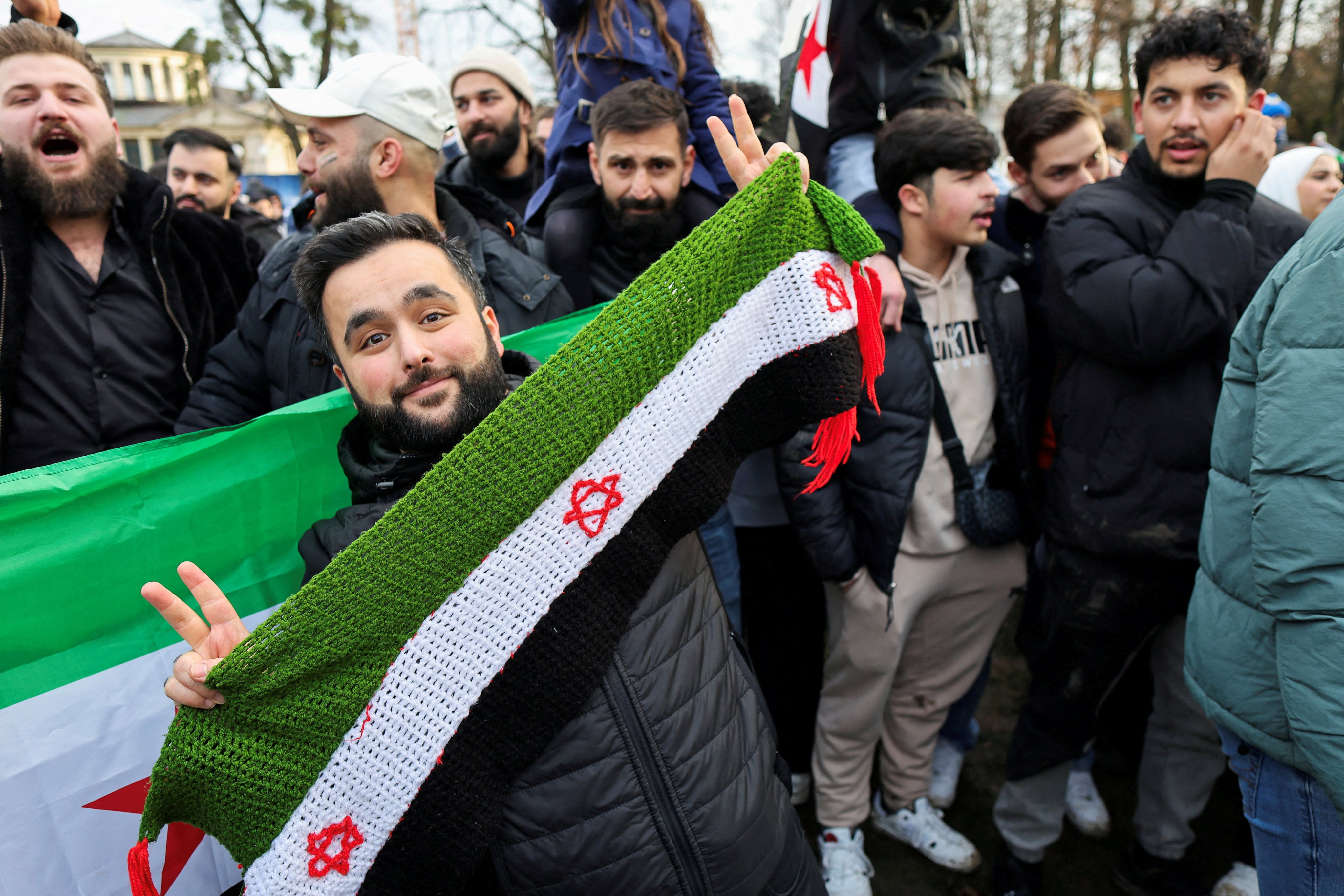 Members of Germany’s Syria community in Bonn celebrate the end of Bashar al-Assad’s rule. Photo: Reuters