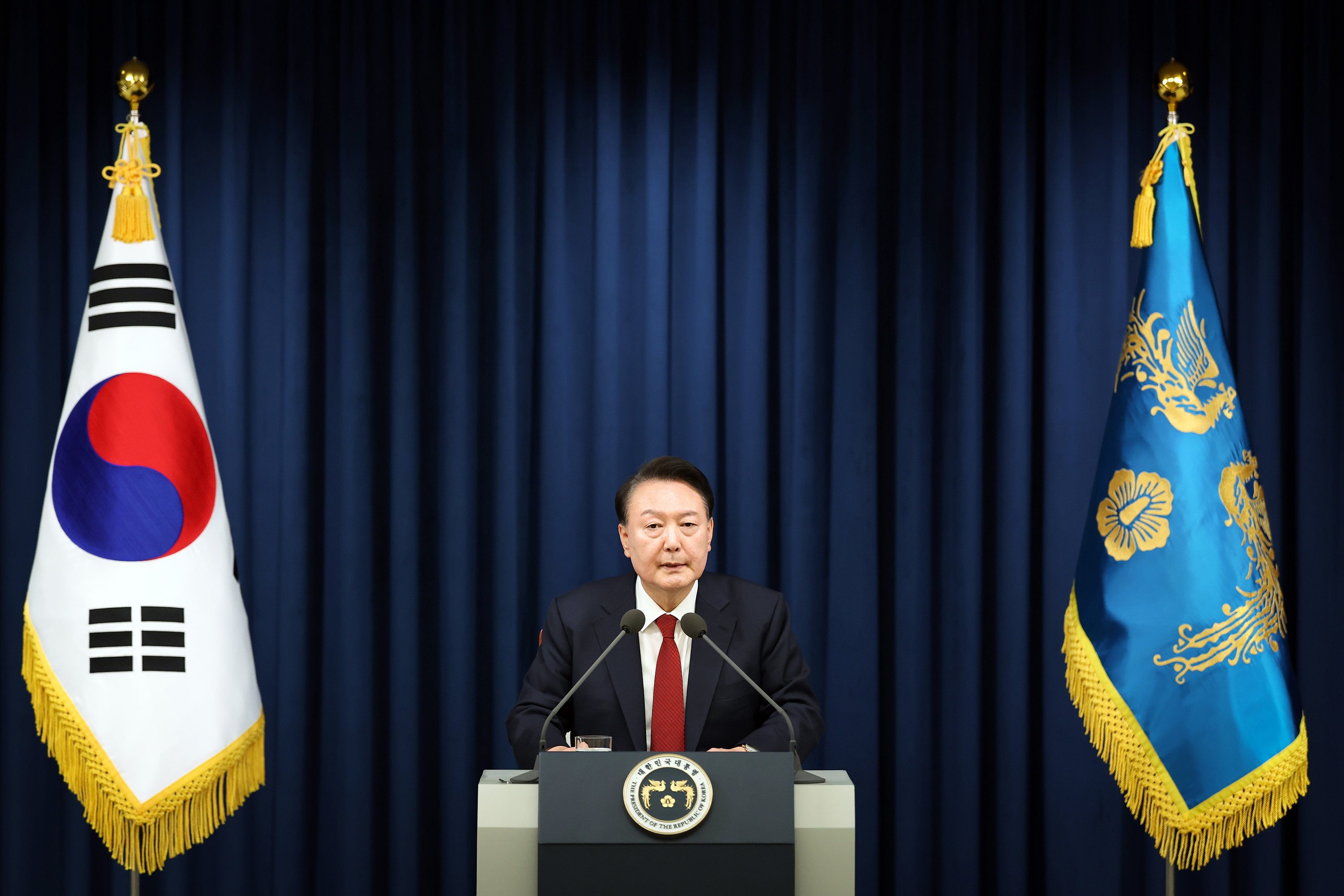 South Korean President Yoon Suk-Yeol speaks during the declaration of emergency martial law on December 3 in Seoul, South Korea. Photo:: South Korean Presidential Office/TNS