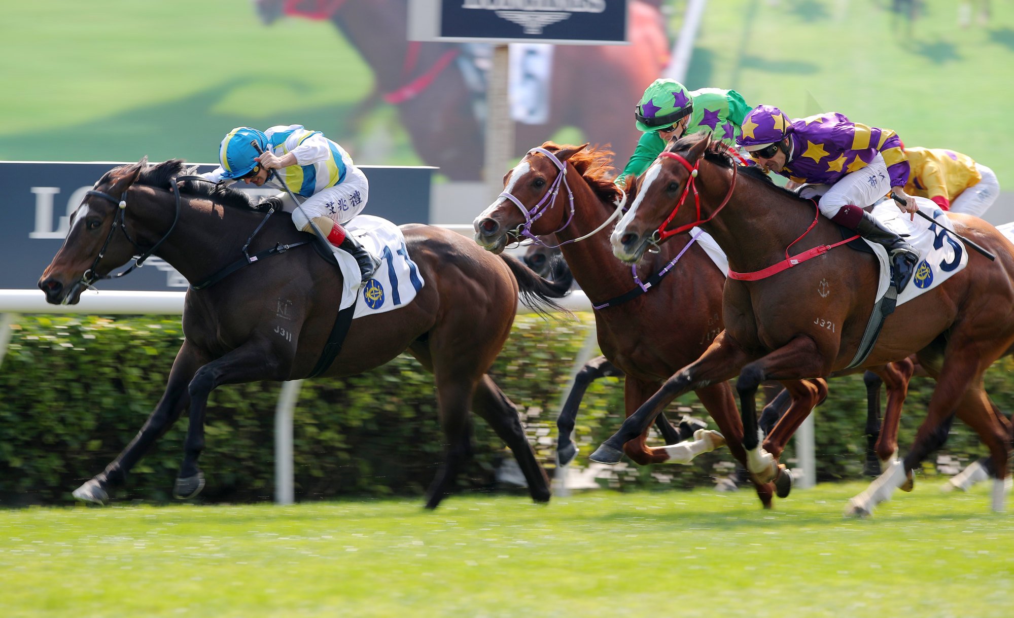 Andrea Atzeni boots home Happy Park at Sha Tin on Sunday.