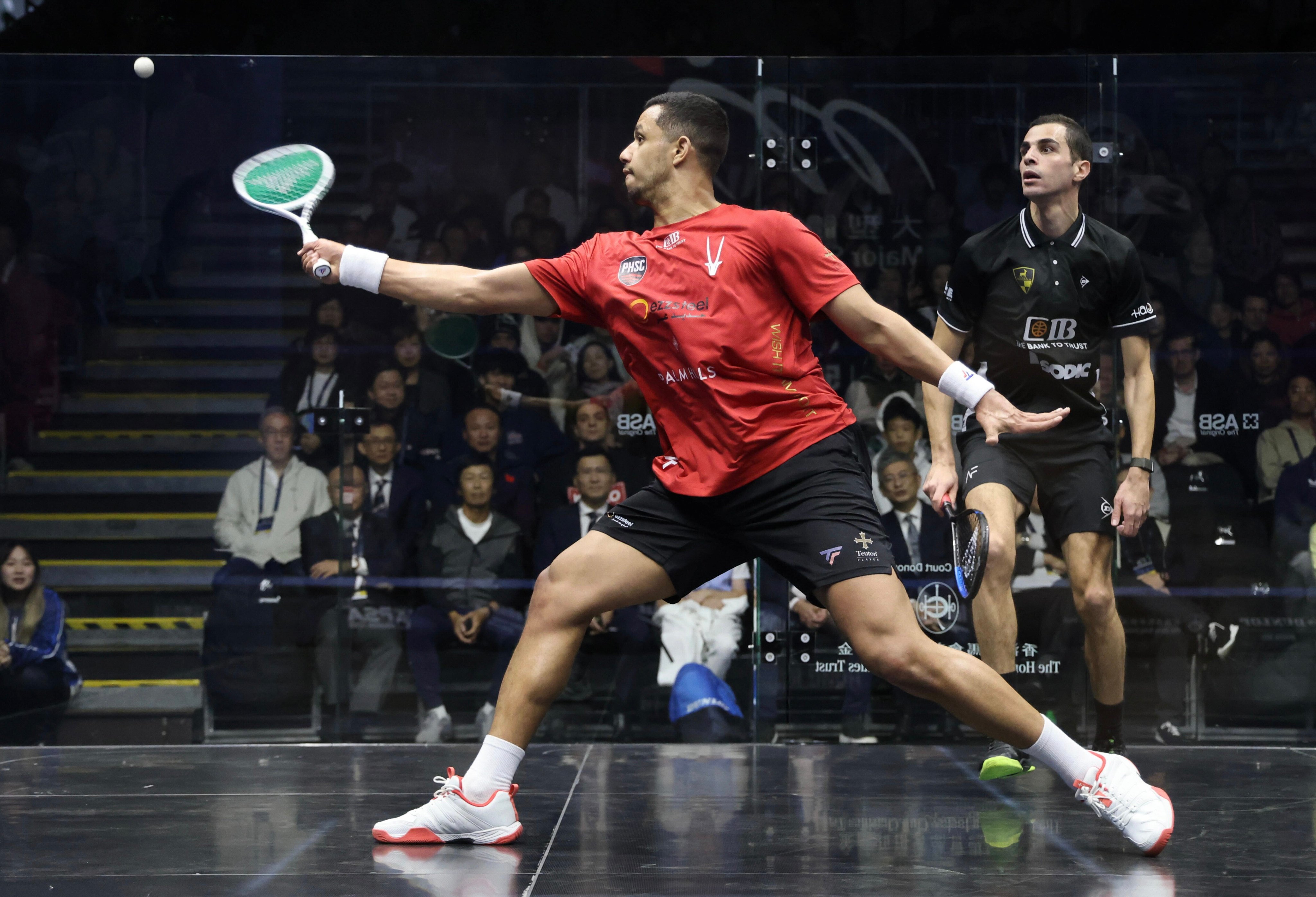 Mostafa Asal aims a shot during his Hong Kong Squash Open final victory over Ali Farag. Photo: Jonathan Wong