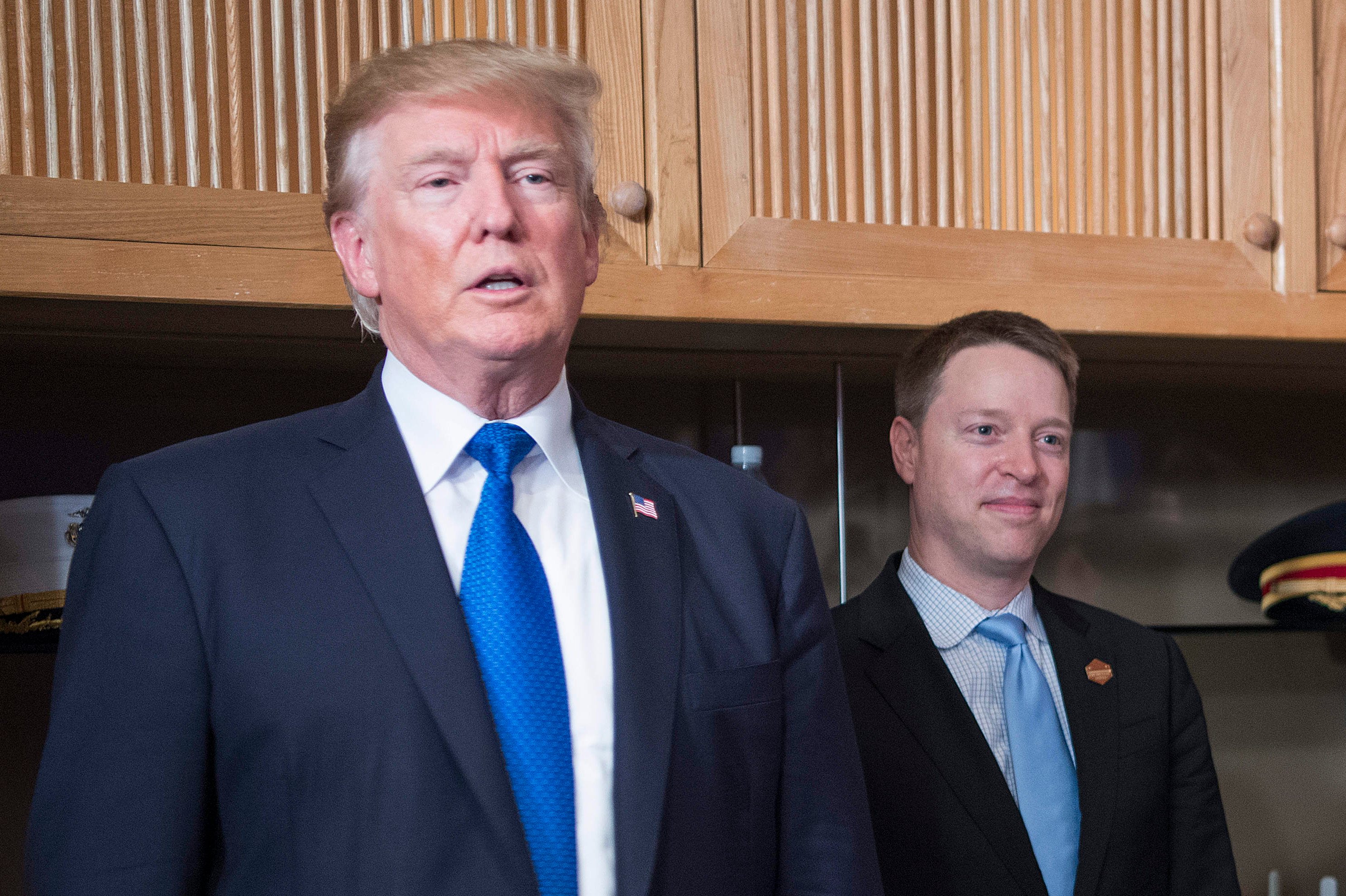 Matthew Pottinger, pictured with Donald Trump, was described as being one of the most influential voices. Photo: AFP 