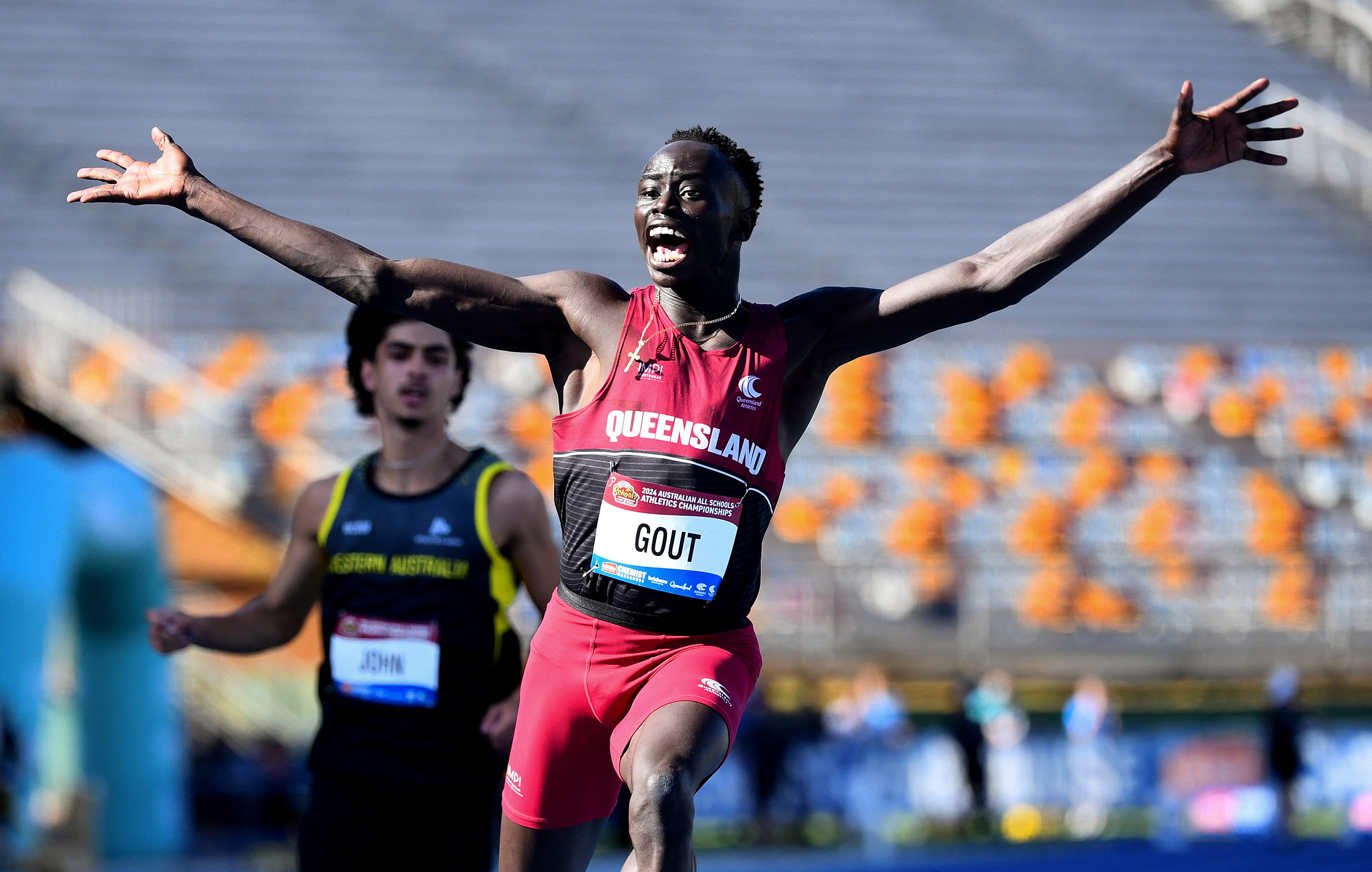 Australian sprinter Gout Gout celebrates winning the Under-18  100m final in 10.04 seconds in Brisbane last Friday. Photo: Reuters