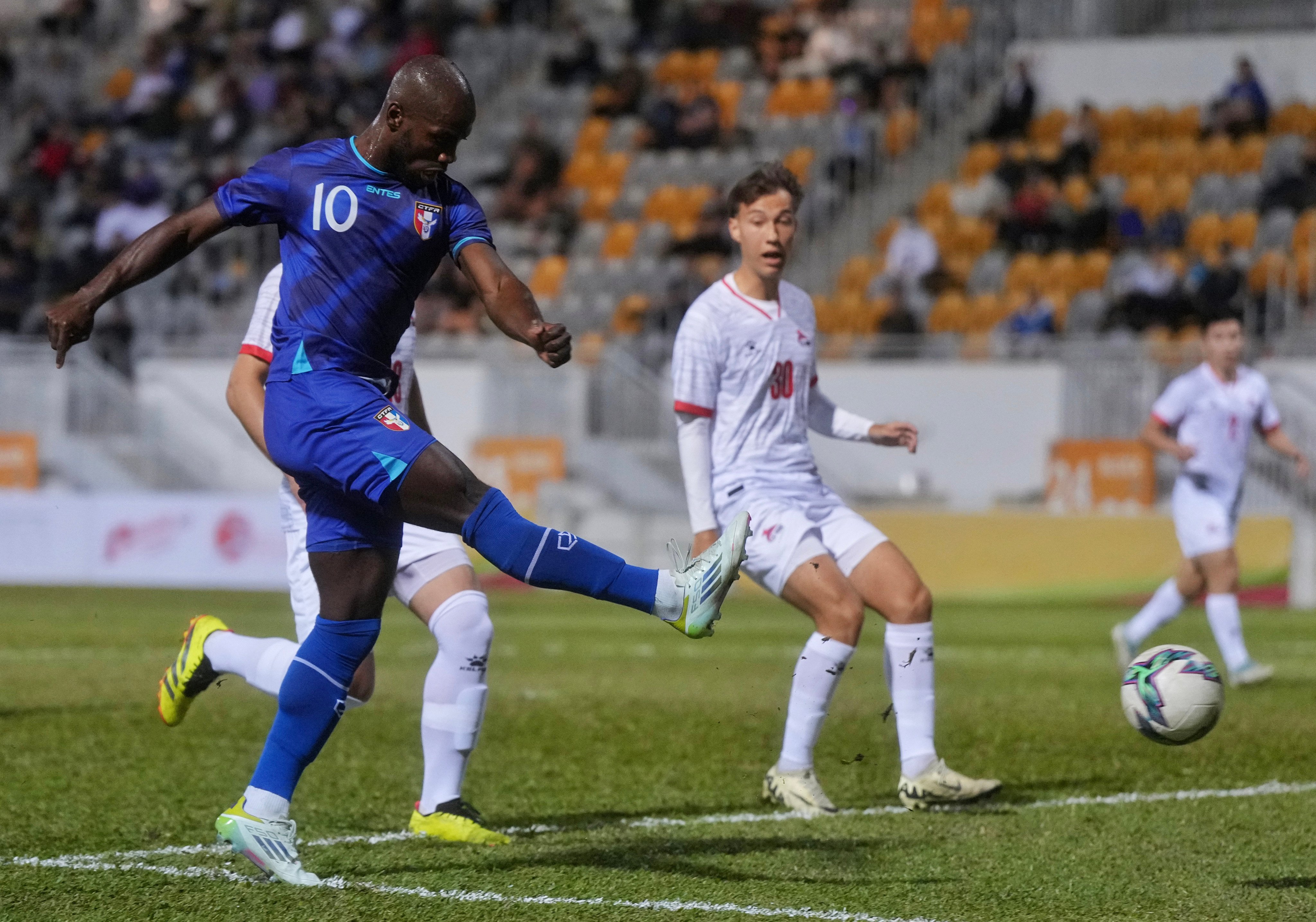 Two-goal striker Ange Kouame sends another effort towards the target. Photo: Elson Li