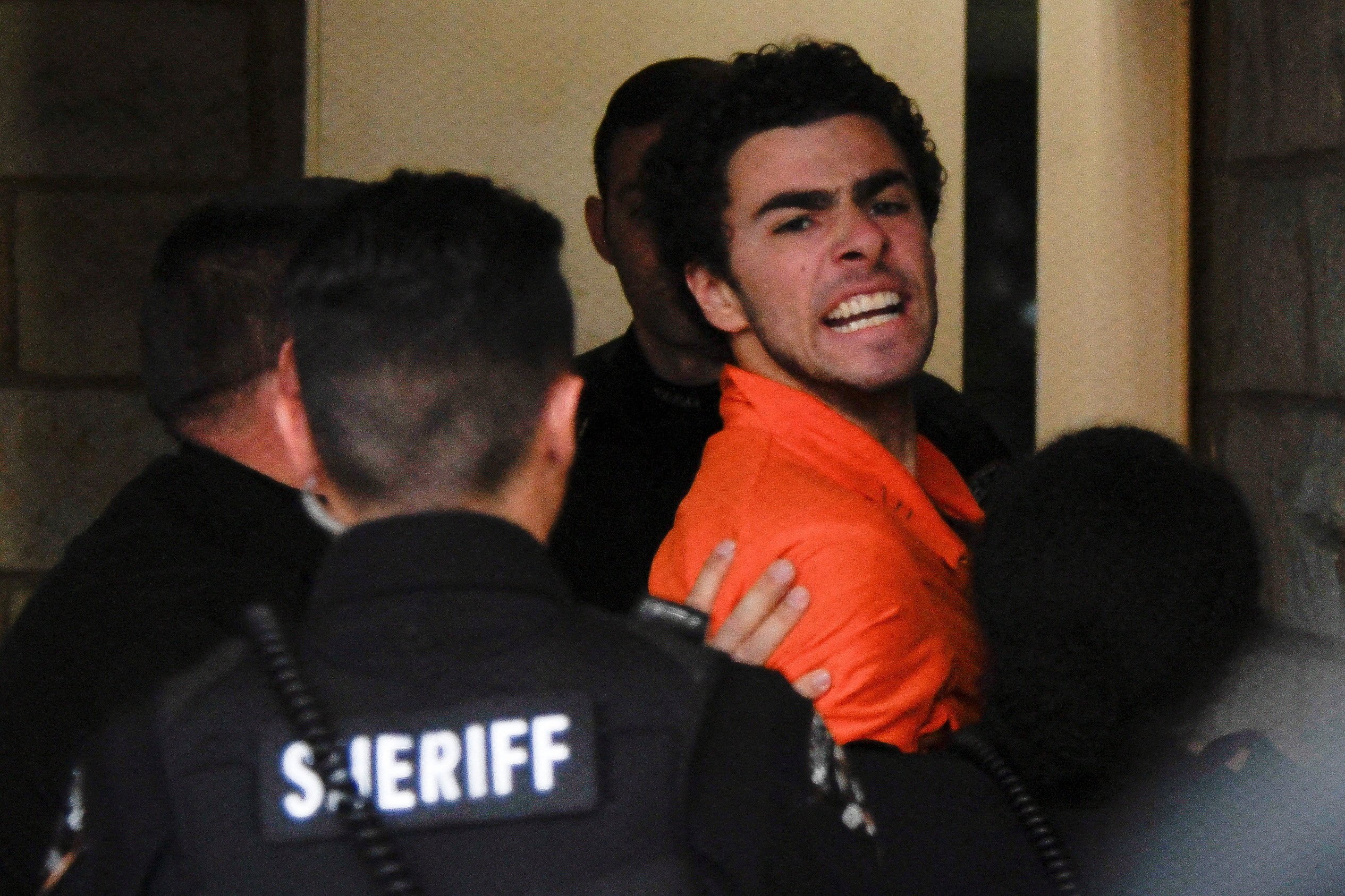 Luigi Mangione arrives for an extradition hearing at Blair County Court House in Hollidaysburg, Pennsylvania, Photo: Reuters