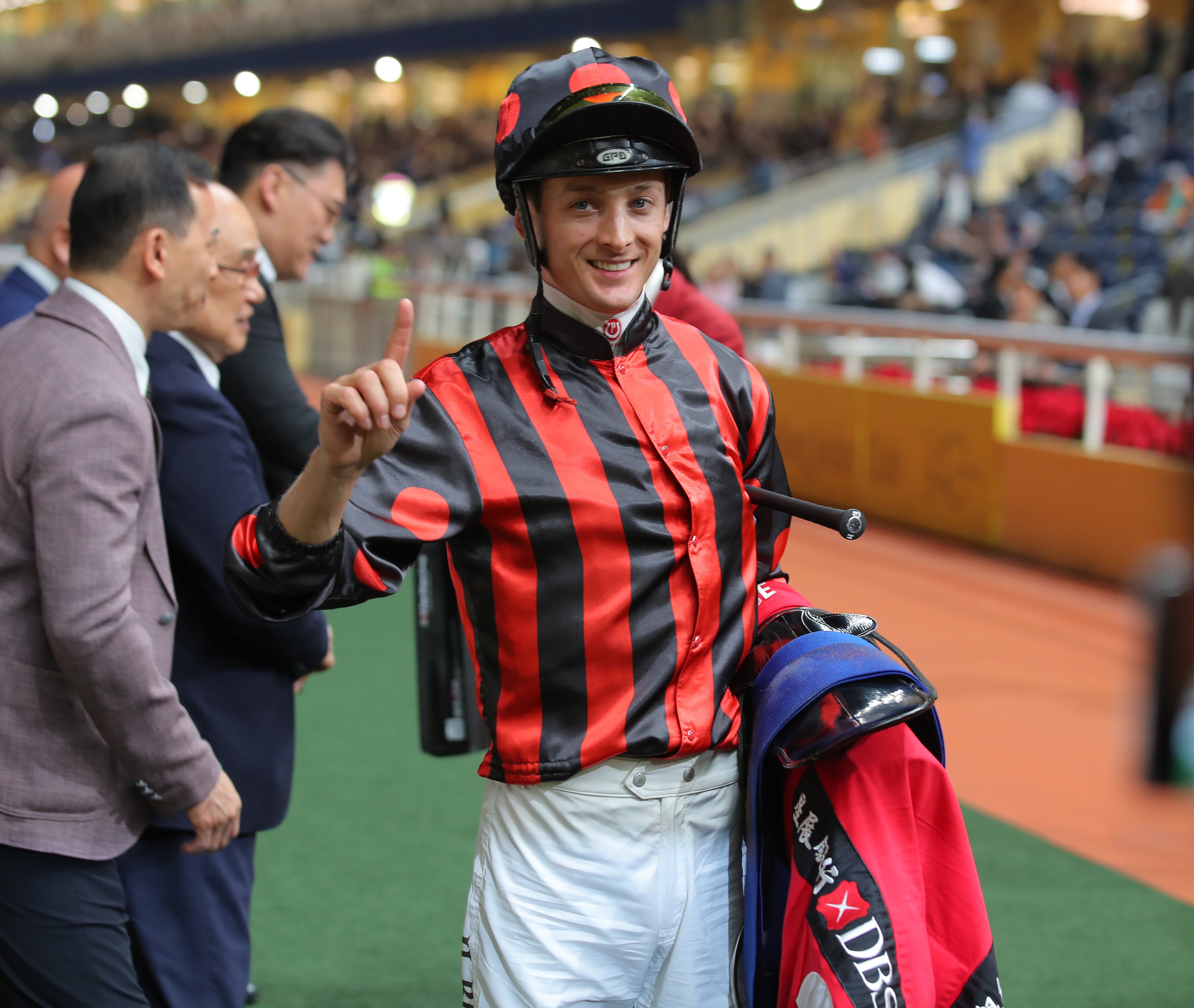 Harry Bentley soaks up his 100th Hong Kong winner at Happy Valley on Wednesday night. Photos: Kenneth Chan