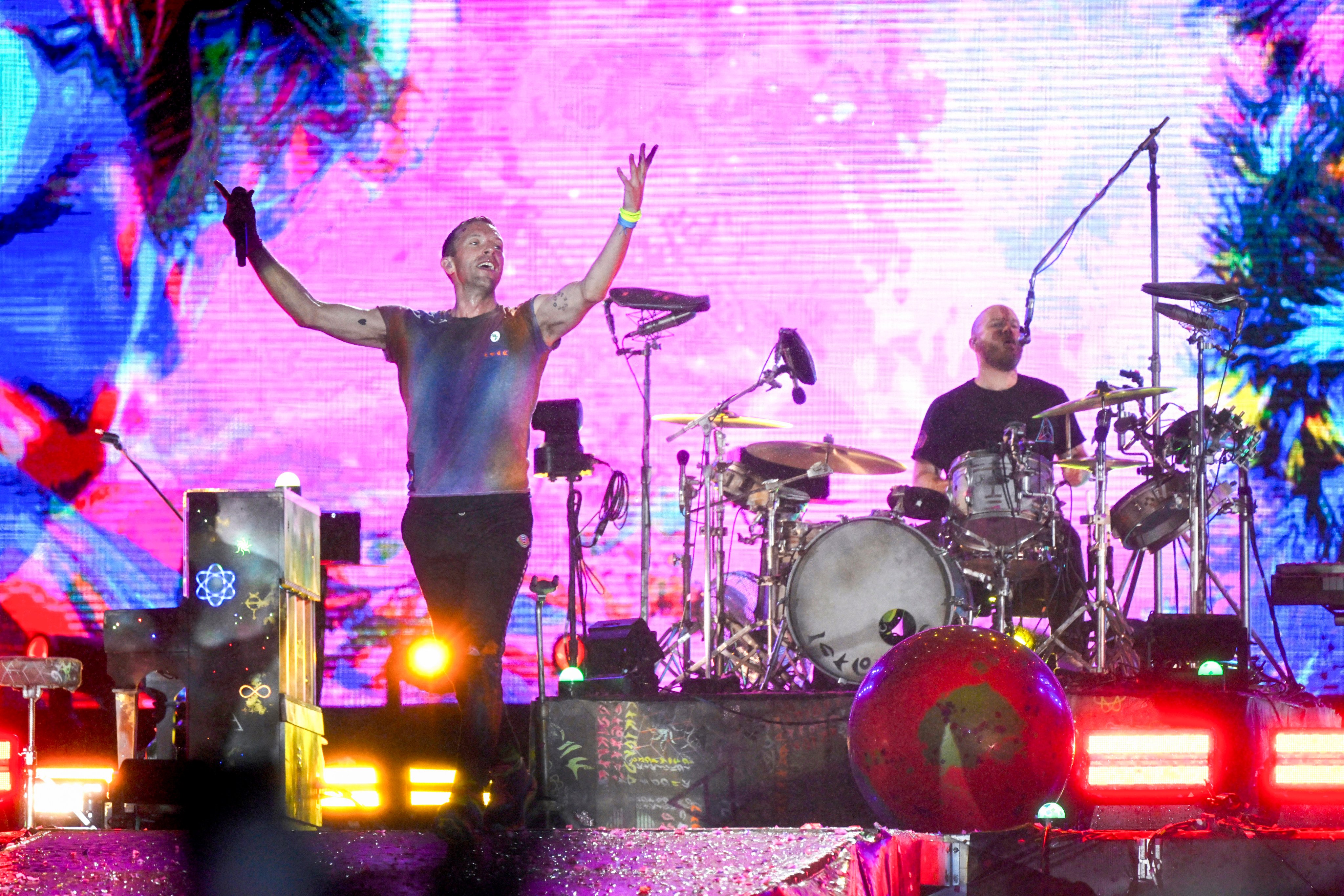 Singer Chris Martin (left) and drummer Will Champion of Coldplay perform in Rio de Janeiro, Brazil, in 2022. The British band will be at Kowloon’s Kai Tak Sports Park in April. Photo: AFP