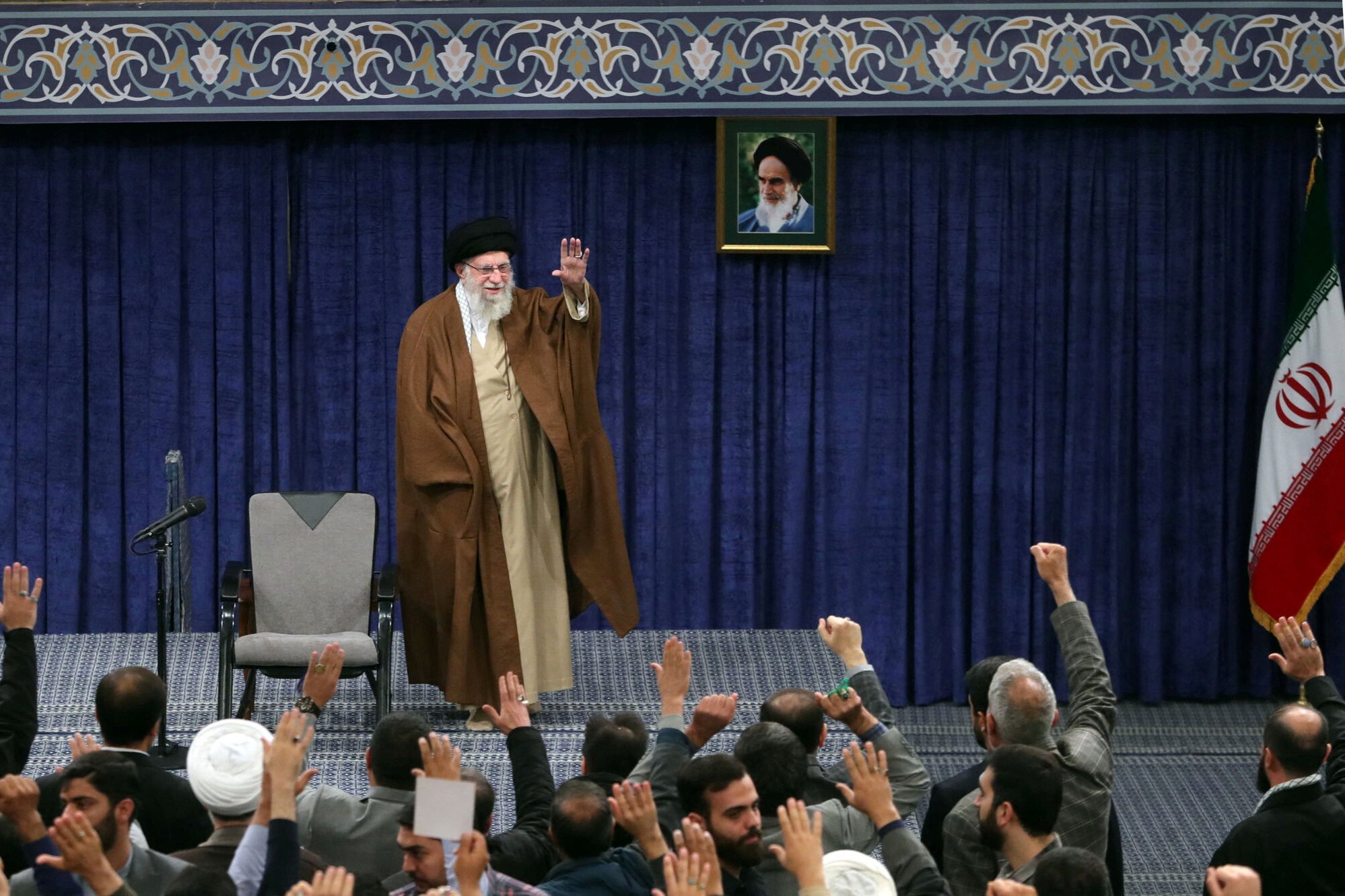 Iran’s Supreme Leader Ayatollah Ali Khamenei waves during a meeting in Tehran. Photo: Reuters