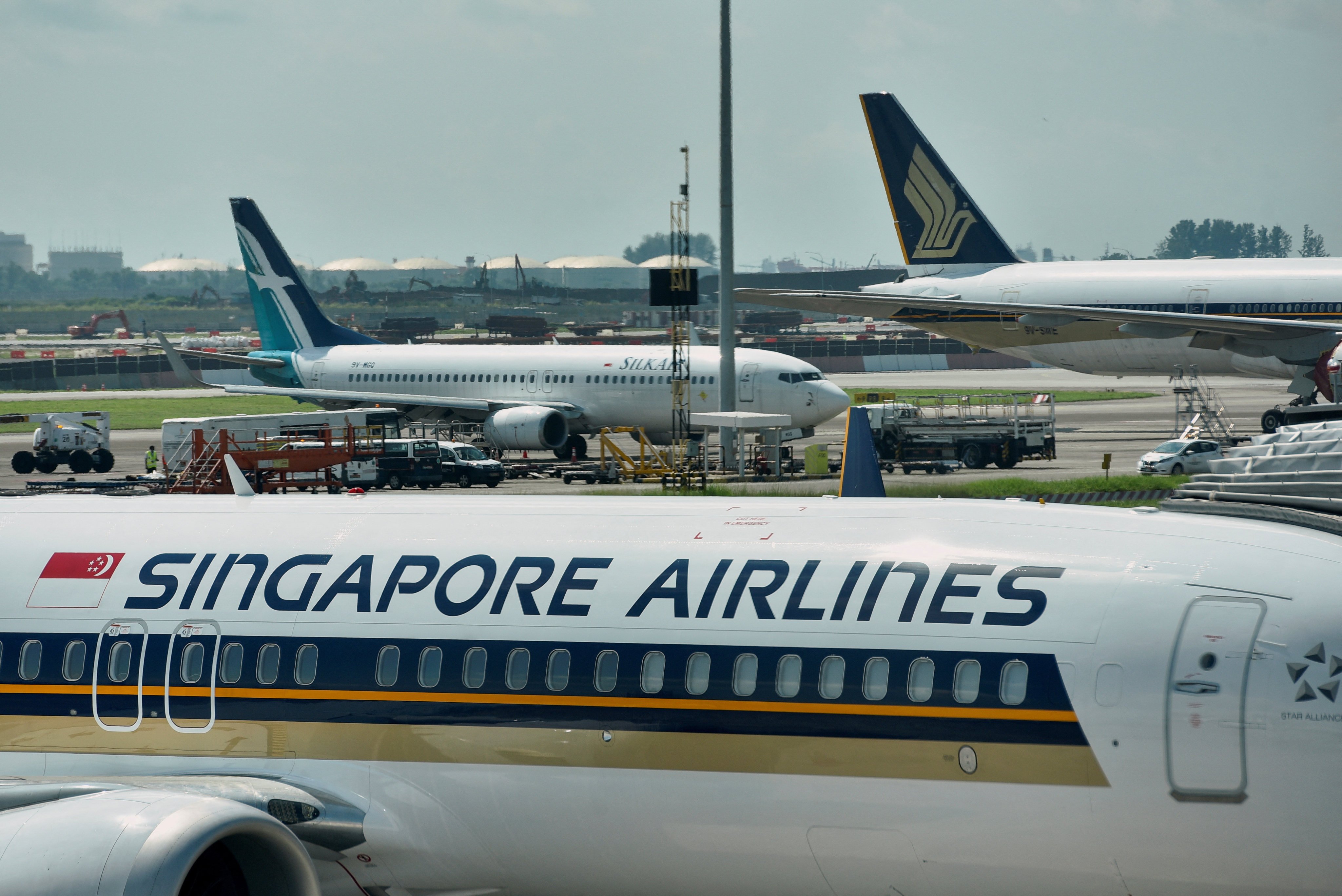 Singapore Airlines planes sit on the tarmac at Changi Airport in Singapore. Photo: Reuters