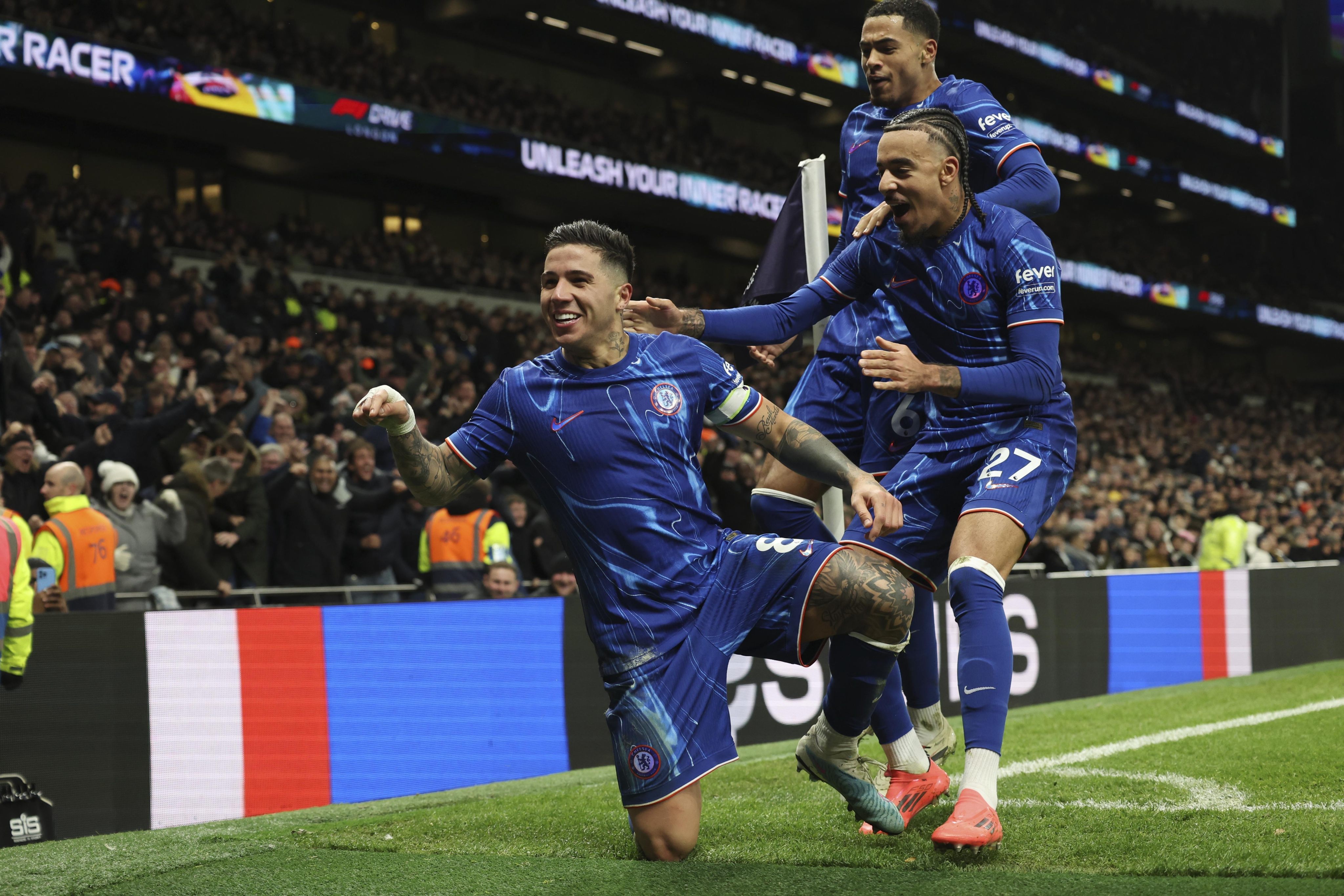 Chelsea’s Enzo Fernandez, left, celebrates after the latest goal from his impressive recent form, which came against Tottenham. Photo: AP