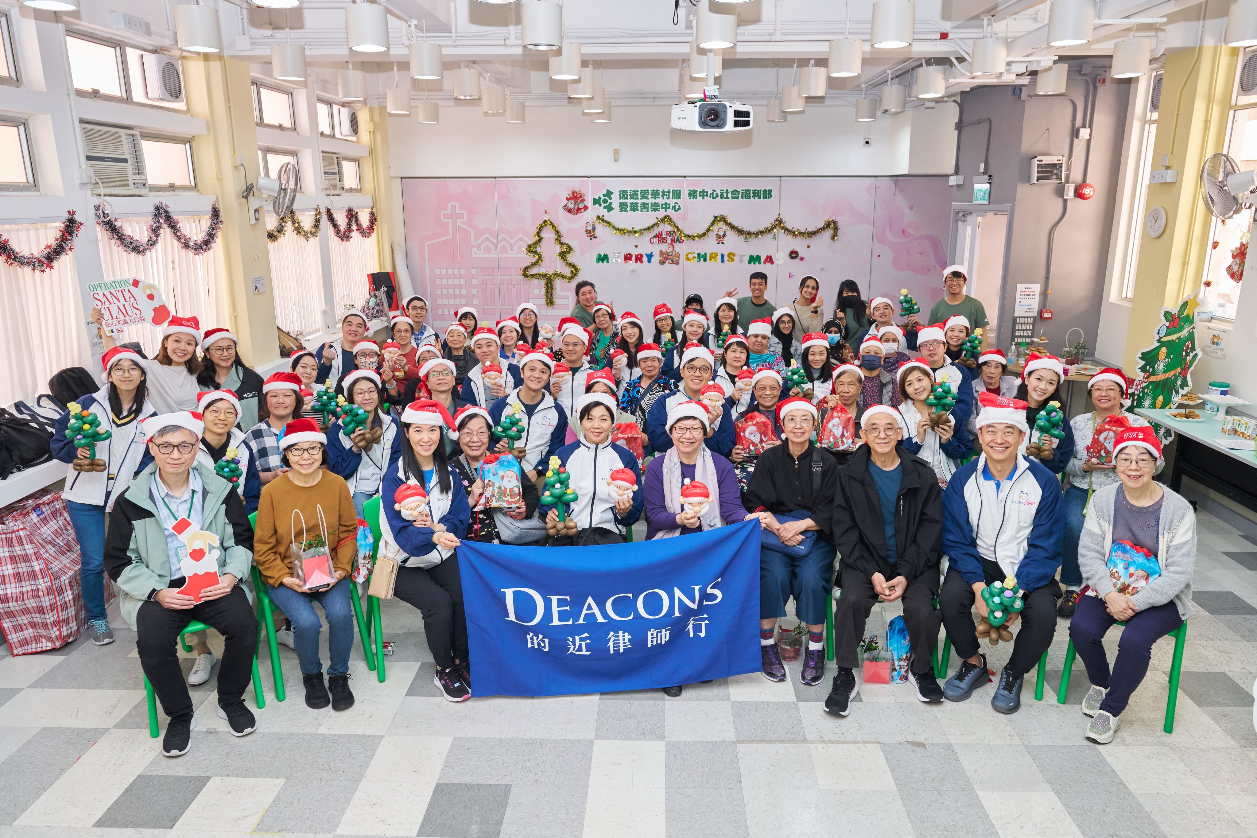 Volunteers from Deacons have participated in an event at  the Epworth Neighbourhood Elderly Centre to support Operation Santa Claus. Photo: Wong Kin Fung
