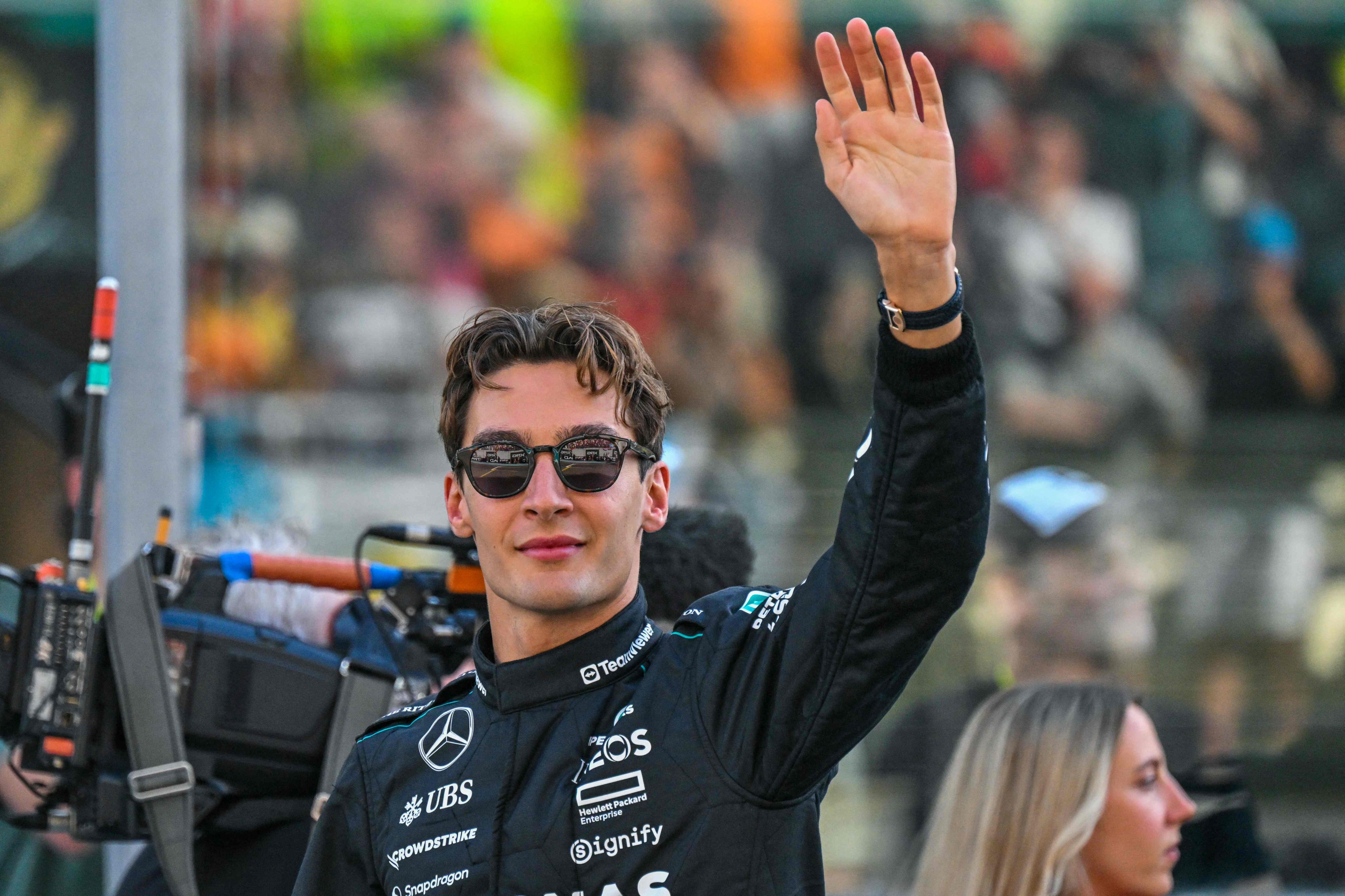 Mercedes’ driver George Russell arrives ahead of the Abu Dhabi Formula One Grand Prix on December 8. Photo: AFP