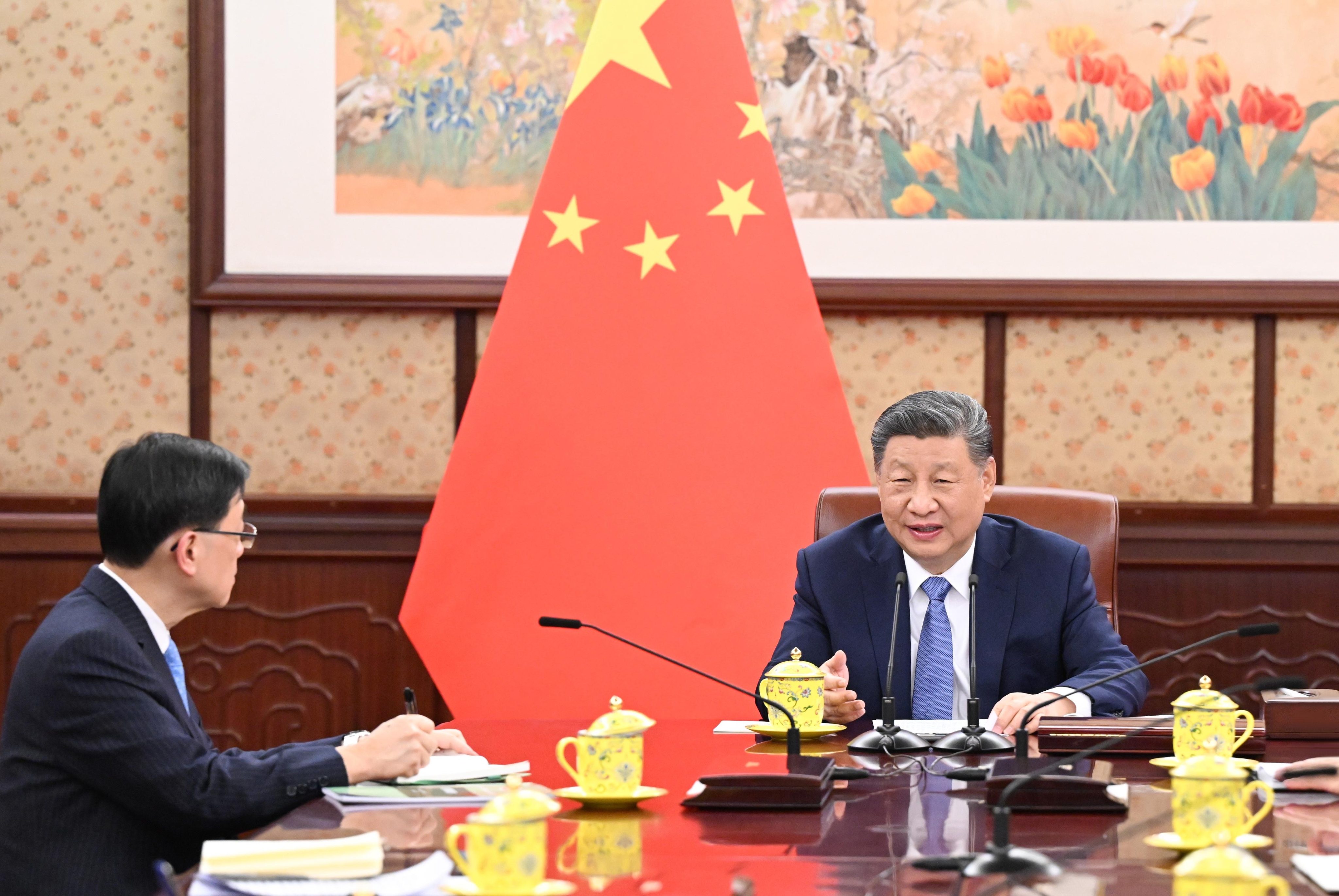 President Xi Jinping (right) meets Hong Kong Chief Executive John Lee in Beijing on Friday.  Photo: Handout