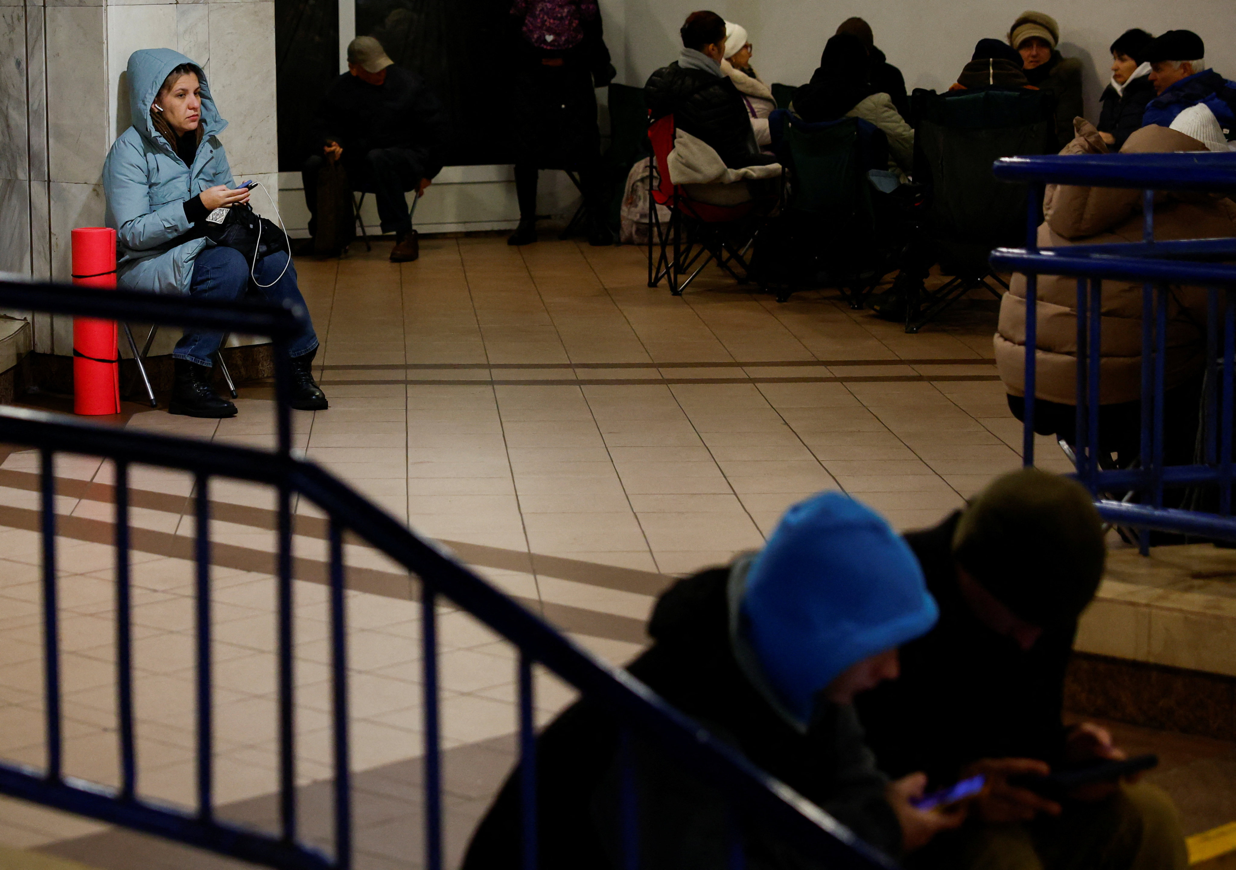 People take shelter inside a Kyiv metro station during a Russian strike on Friday. Photo: Reuters