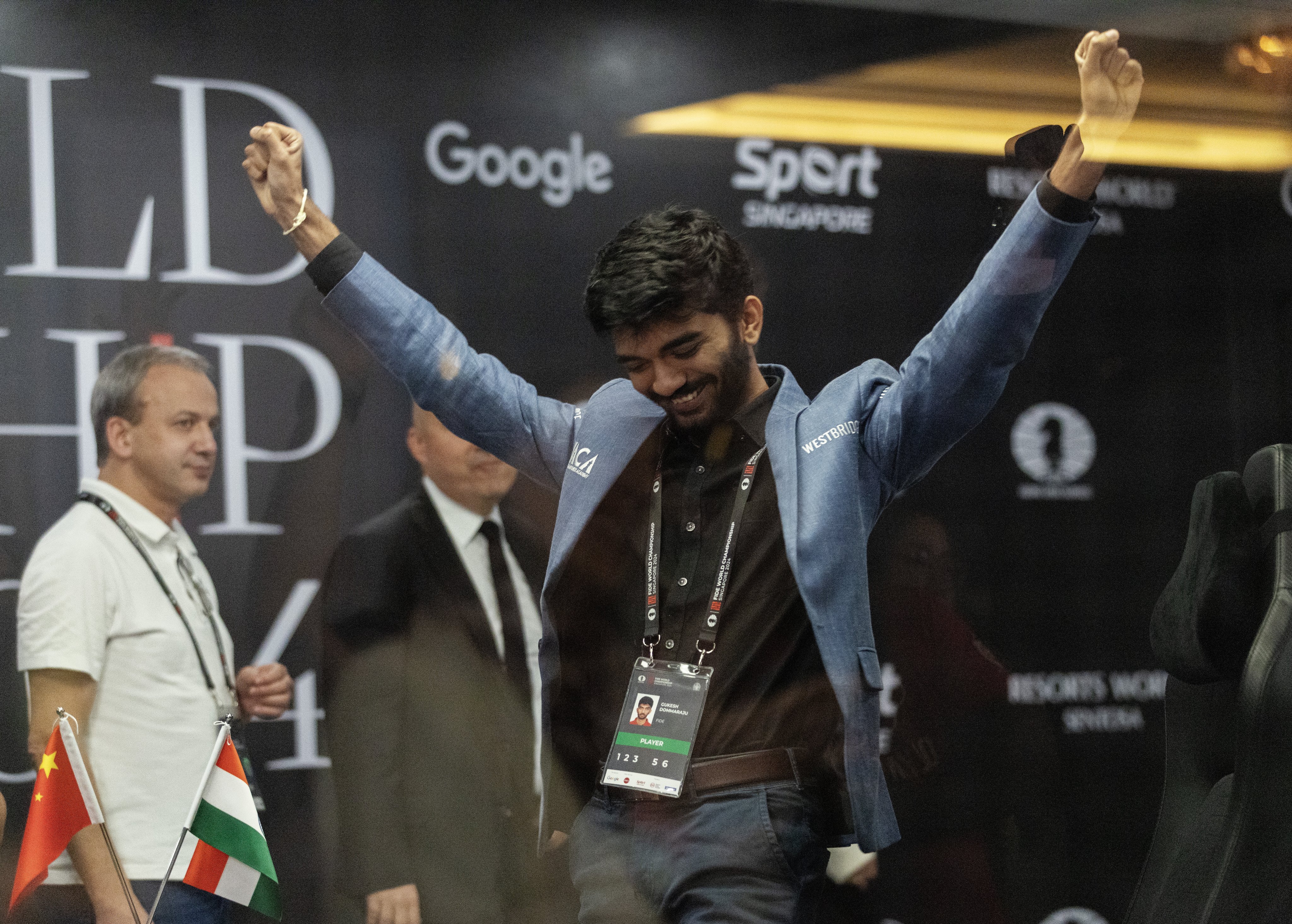 Chess grandmaster Gukesh Dommaraju of India celebrates after winning game 14 against China’s Ding Liren at the FIDE World Chess Championship in Singapore on Thursday. Photo: EPA-EFE