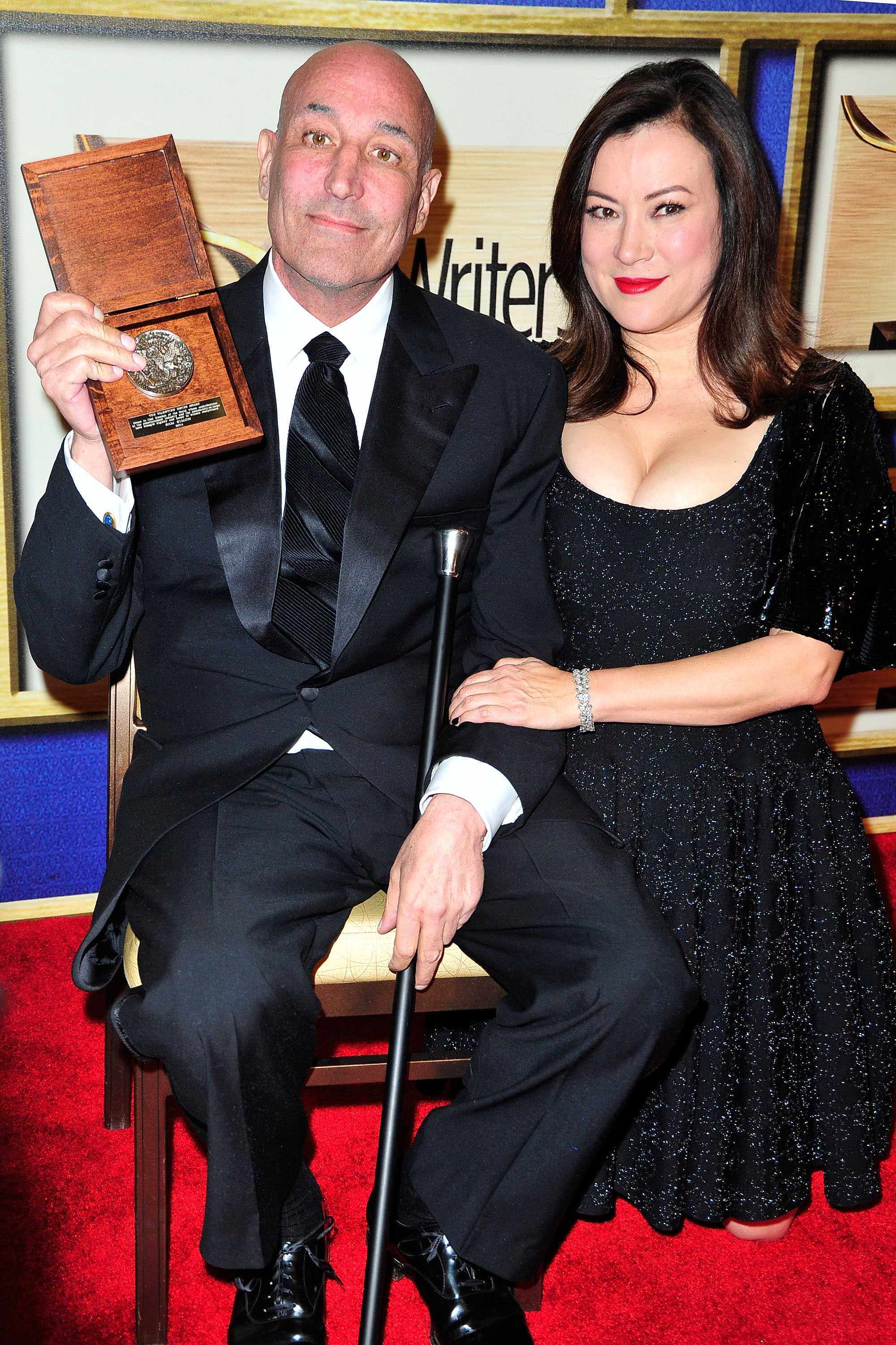 The late producer and philanthropist Sam Simon with his first wife Jennifer Tilly pictured at the 2014 Writers Guild Awards in LA. Photo: WireImage