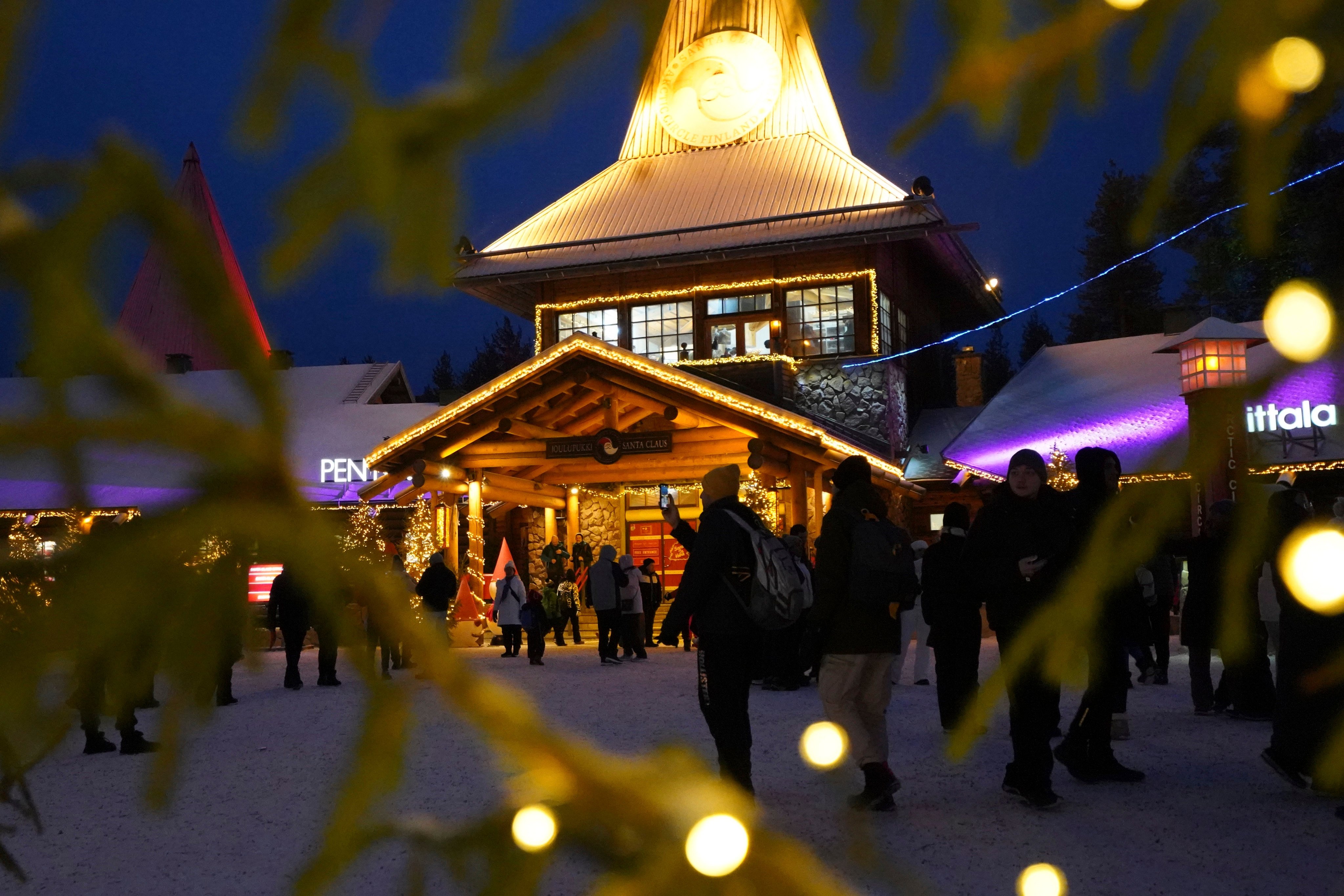 Tourists gather at Santa Claus Village in Rovaniemi, Finland. Photo: AP