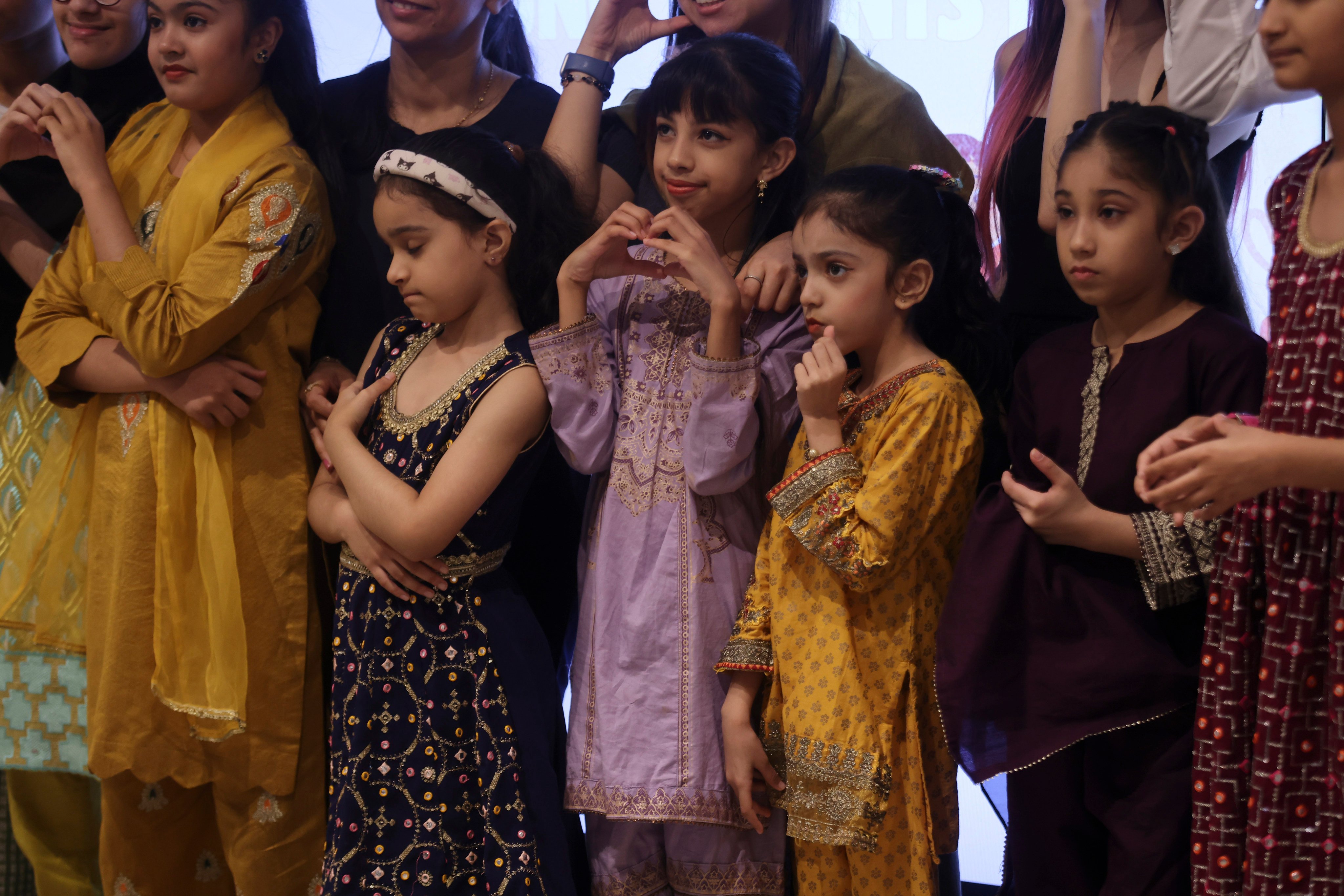 Members of the EM Ensemble Band, a choir started to help non-Chinese speaking children learn Chinese and music, put up a performance in Hong Kong on September 14. Photo: Jonathan Wong