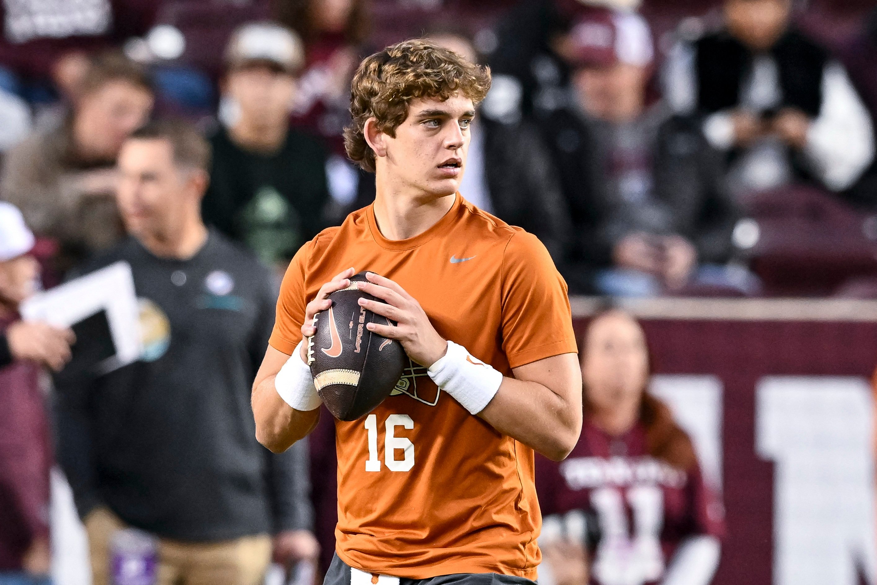 Texas Longhorns quarterback Arch Manning warms up before a game against the Texas A&M Aggies. Photo: Imagn Images