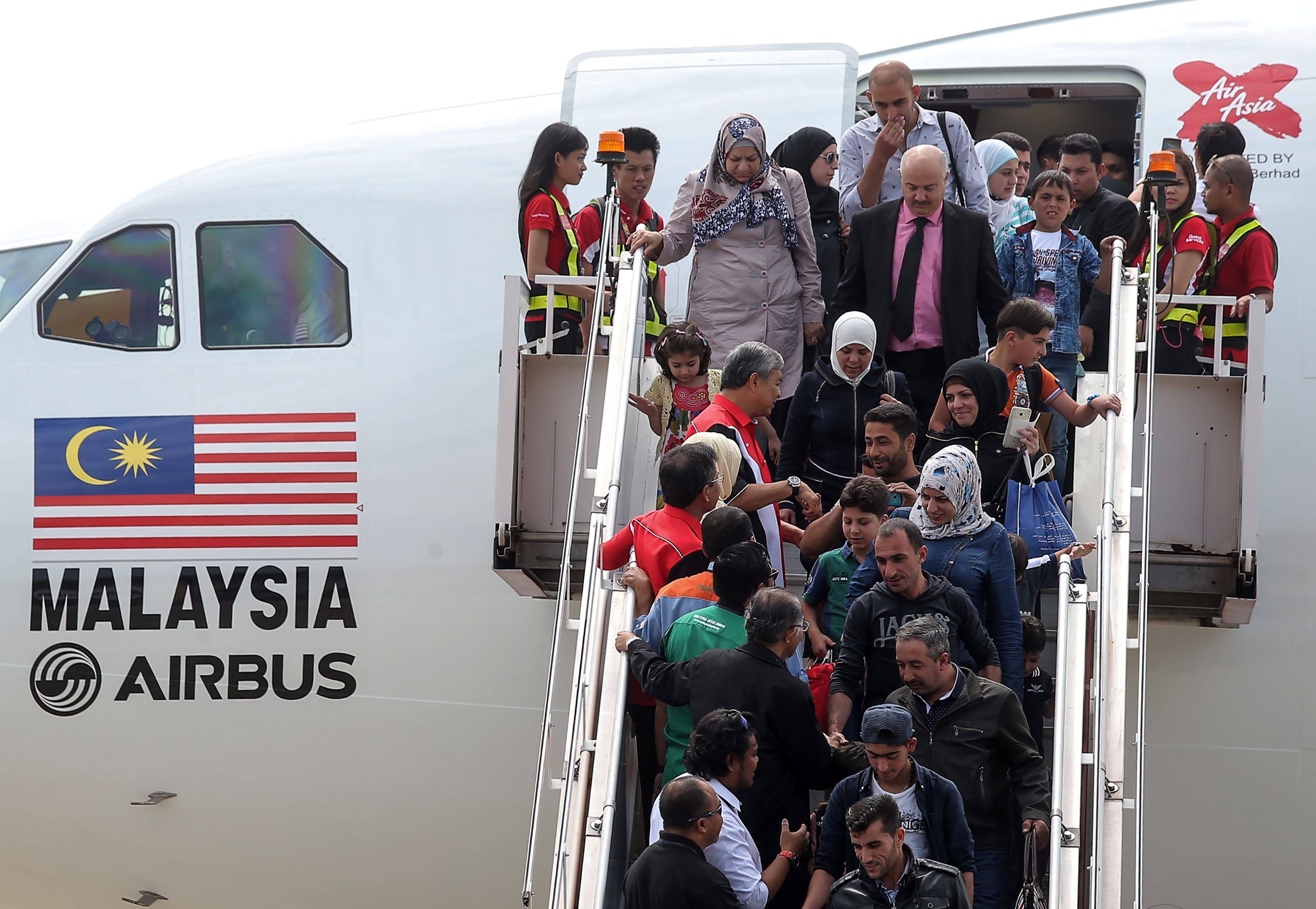 Syrian refugees arrive in Malaysia in 2016. Photo: AFP