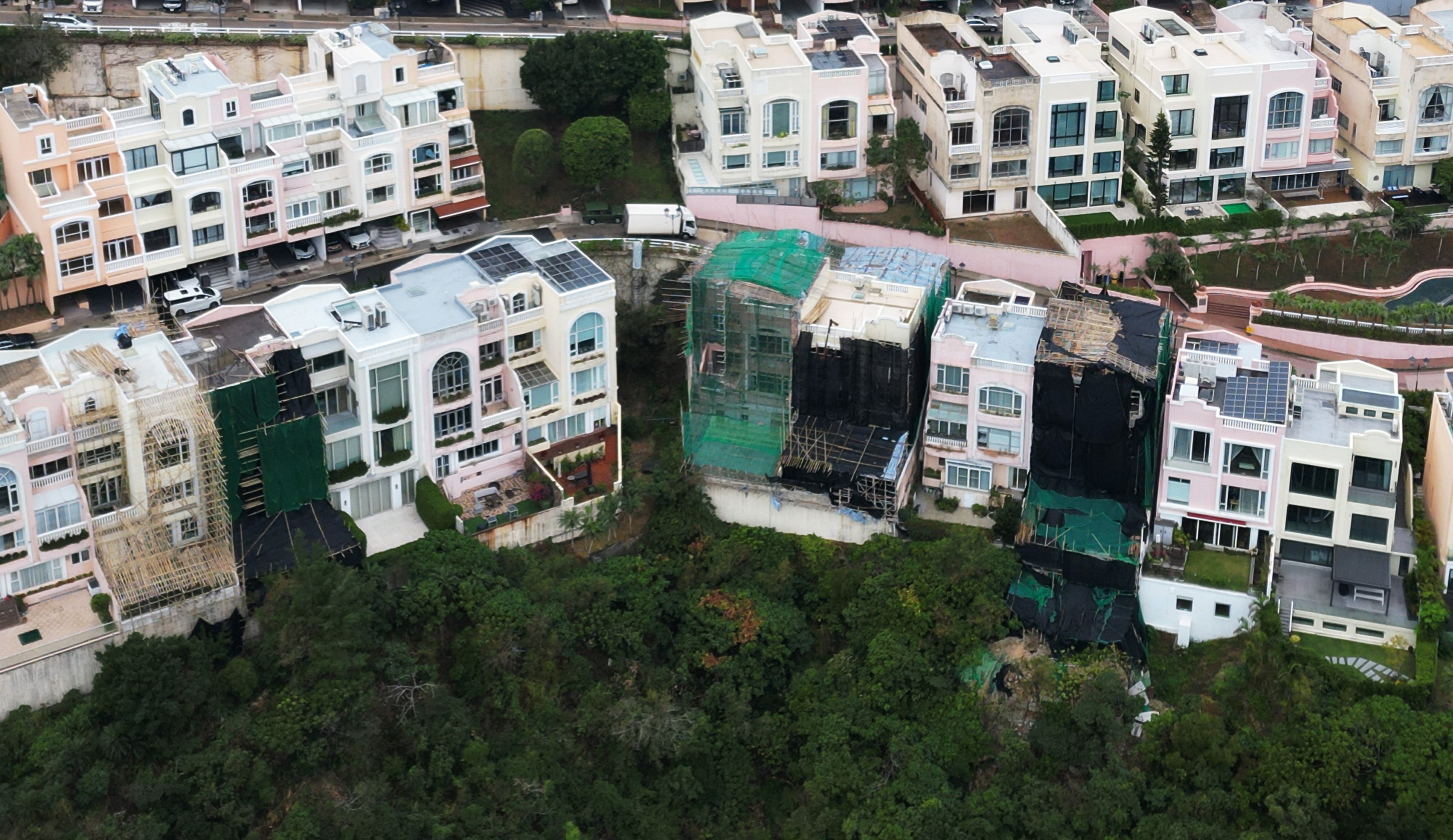 Redhill Peninsula in Tai Tam. At present, authorities can only prosecute landlords who repeatedly ignore removal orders for illegal structures. Photo: May Tse