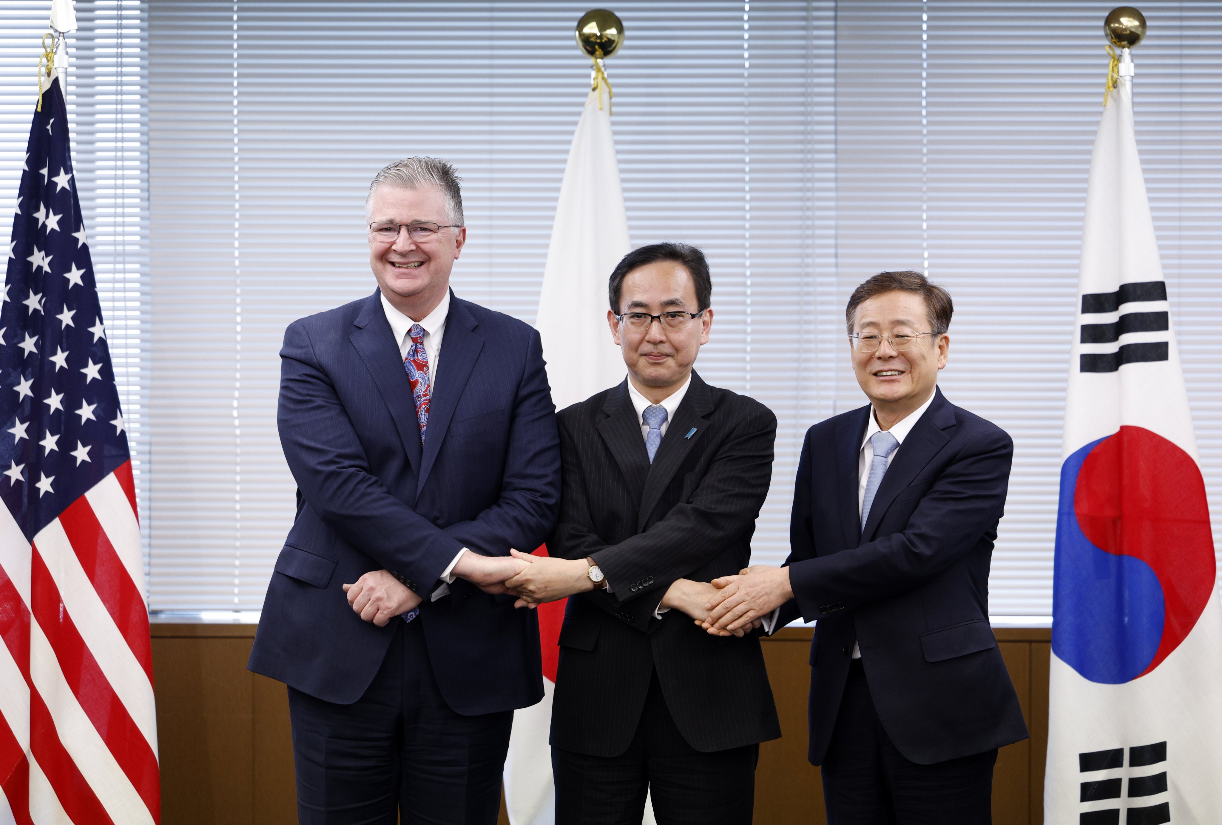 (left to right) US assistant secretary of state for East Asian and Pacific affairs Daniel Kritenbrink, Japan’s Director-General for Asian and Oceanian Affairs Bureau Hiroyuki Namazu, and South Korea’s Vice-Minister for Strategy and Intelligence Cho Koo-rae in Tokyo on Monday. Photo: EPA-EFE