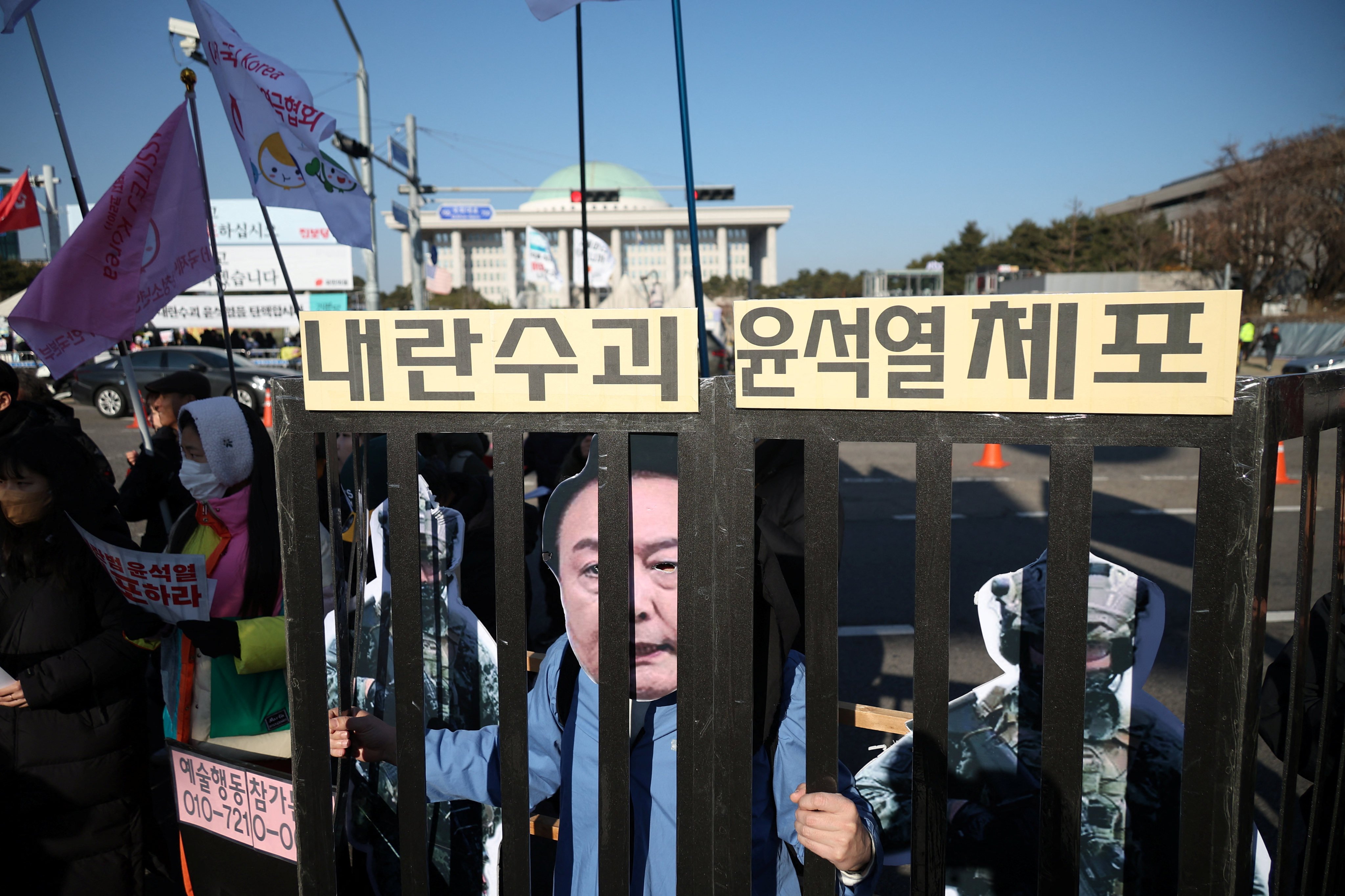 Protesters participate in a rally calling for the impeachment of South Korean President Yoon Suk-yeol in Seoul on Saturday. Photo: Reuters