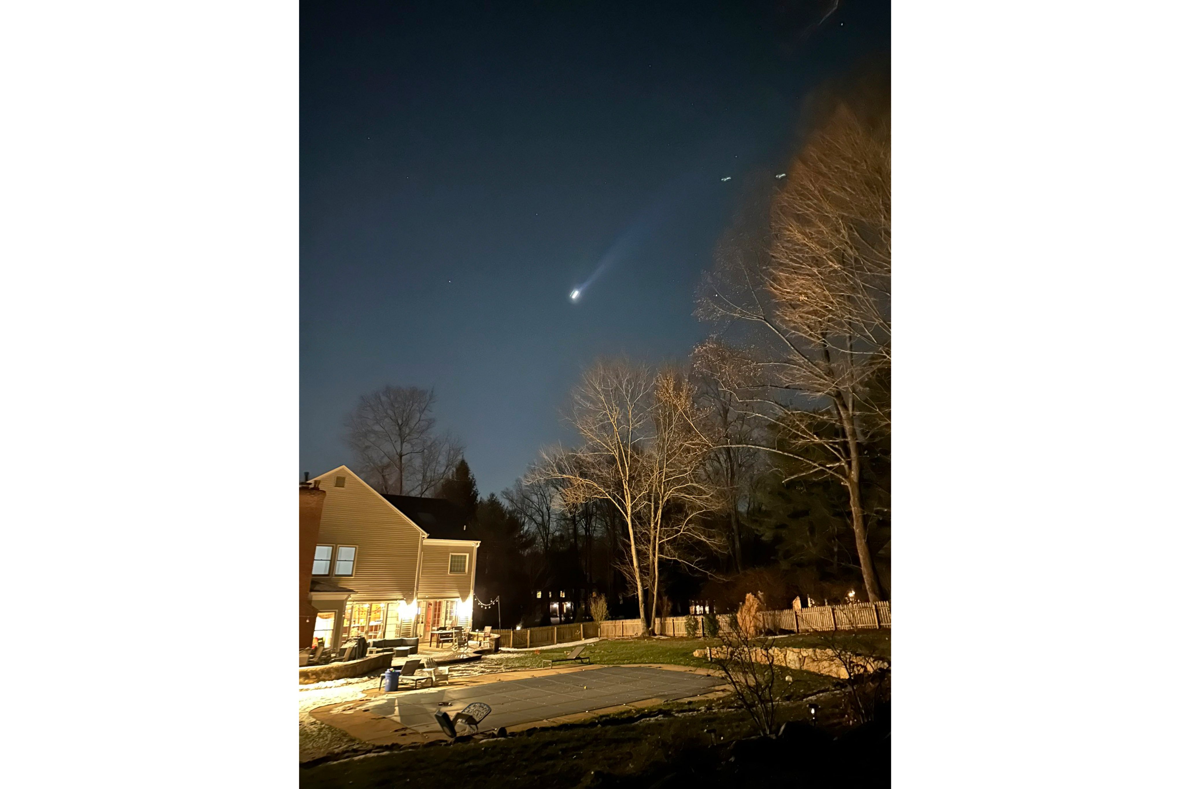 What appear to be multiple drones are seen flying over Bernardsville, New Jersey, on December 5. Photo: Brian Glenn/TMX via AP