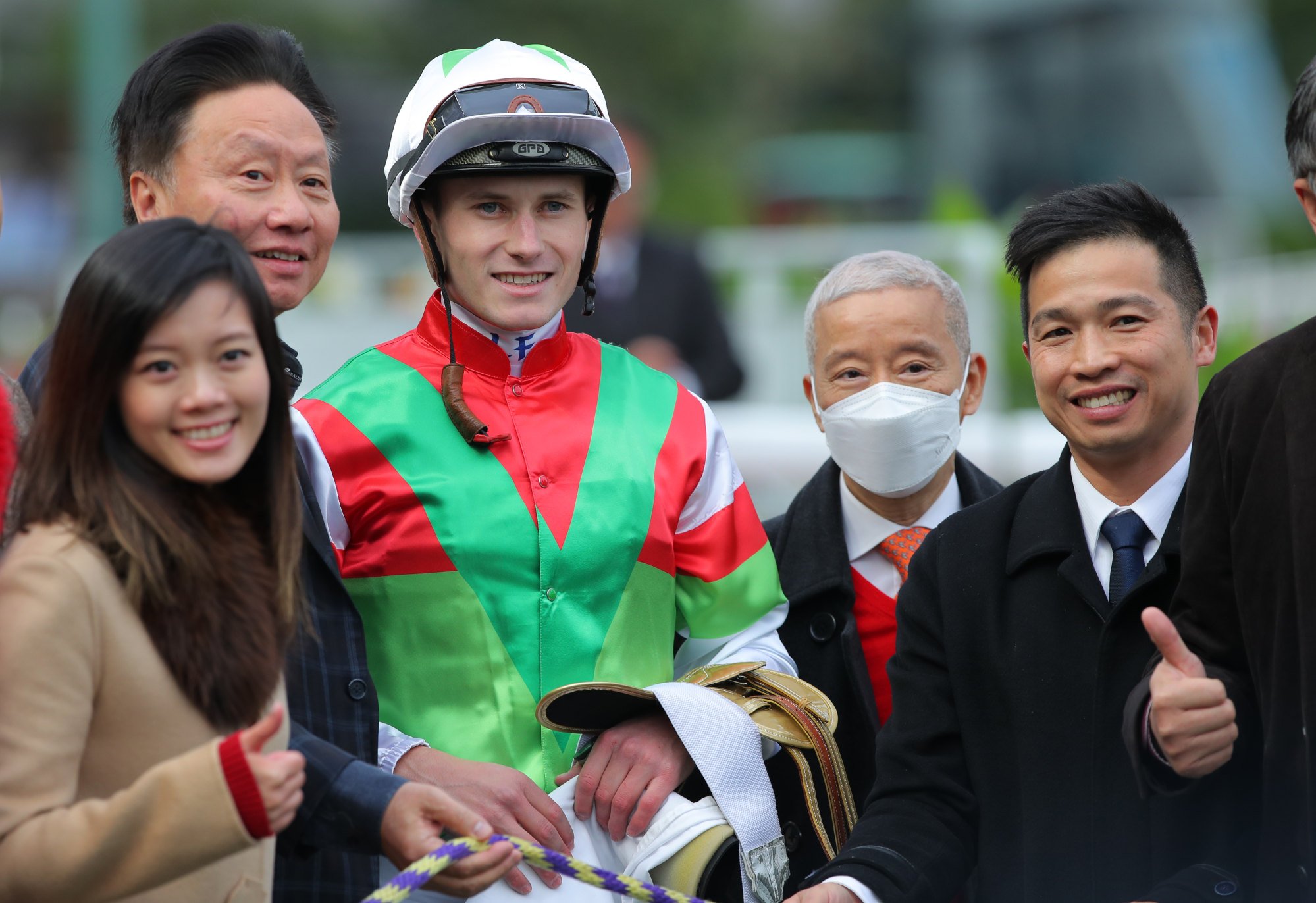 Jockey Luke Ferraris, trainer Benno Yung (second from right) and connections celebrate Tourbillon Prince’s victory.