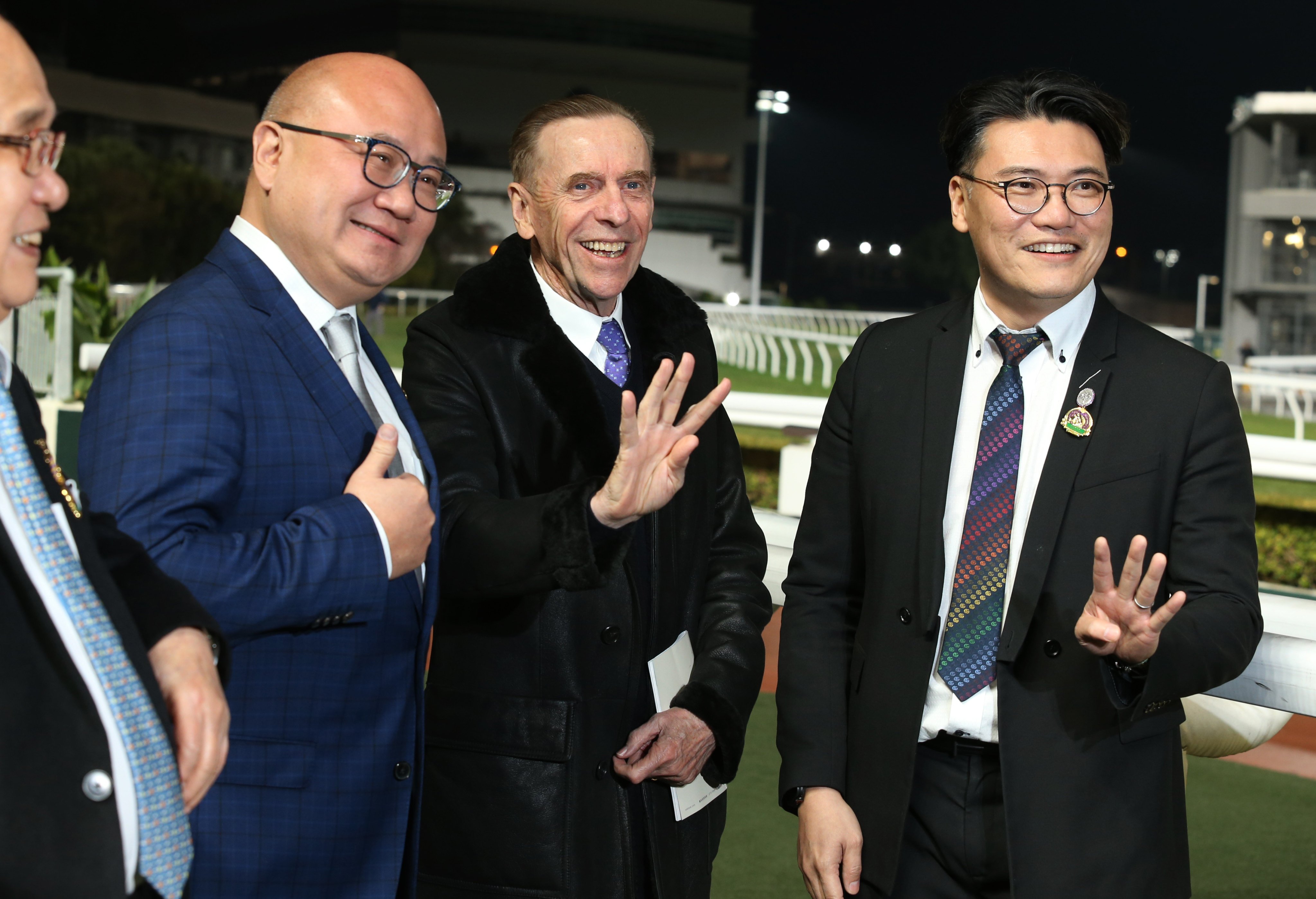 John Size (centre) celebrates his four-timer with connections of Mickley. Photos: Kenneth Chan