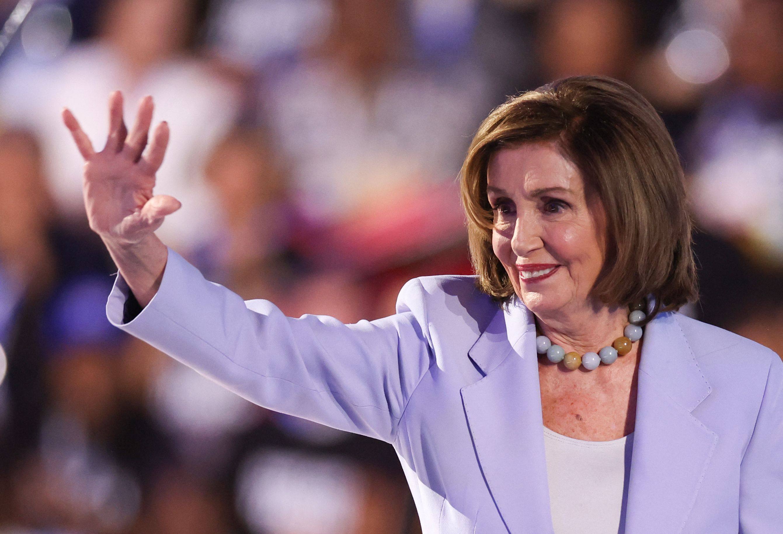 Former US House speaker Nancy Pelosi waves to the crowd on the third day of the Democratic National Convention in Chicago in August. Photo: AFP