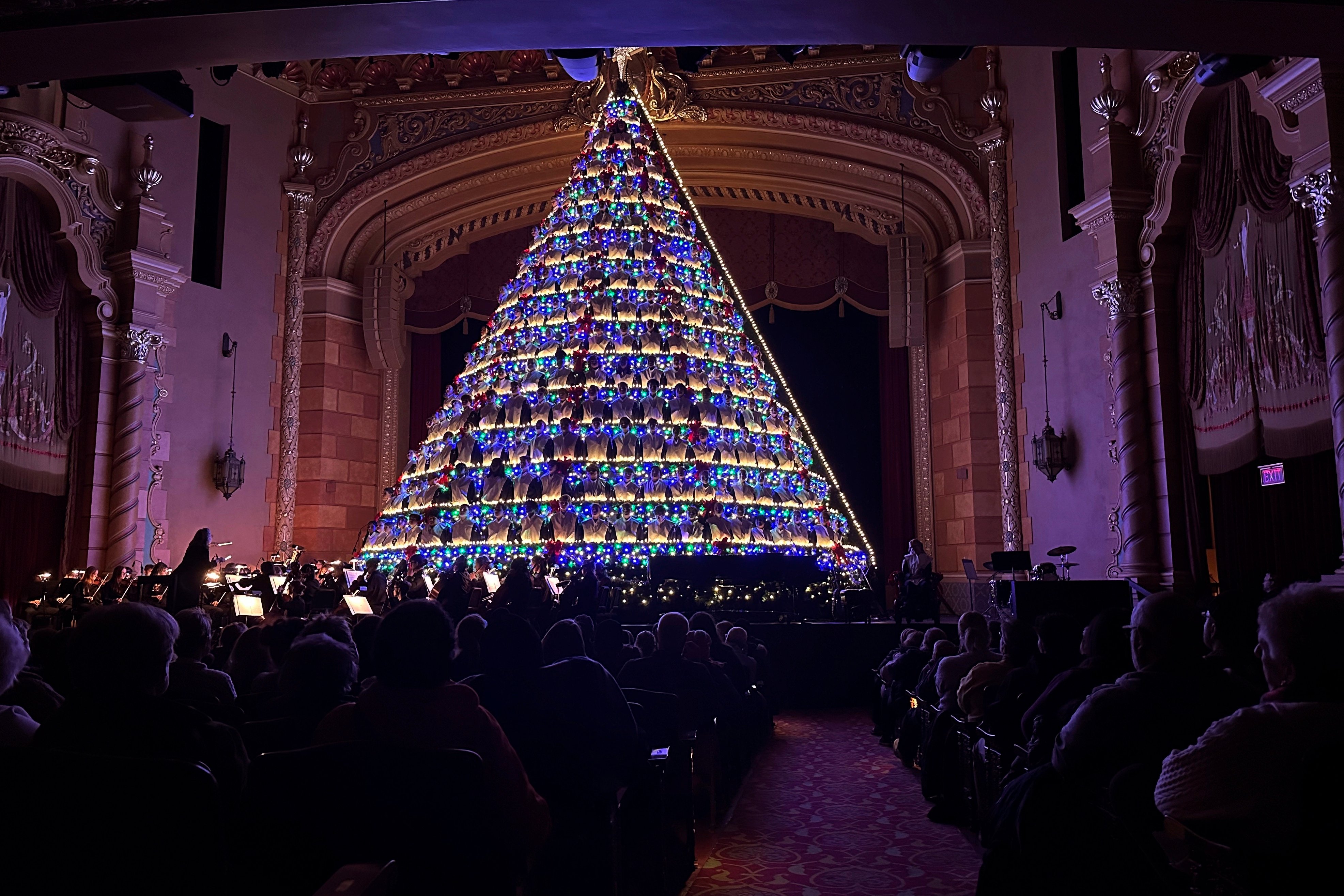 Members of the Mona Shores High School choir have a fun way of performing around Christmas time. Photo: AP 