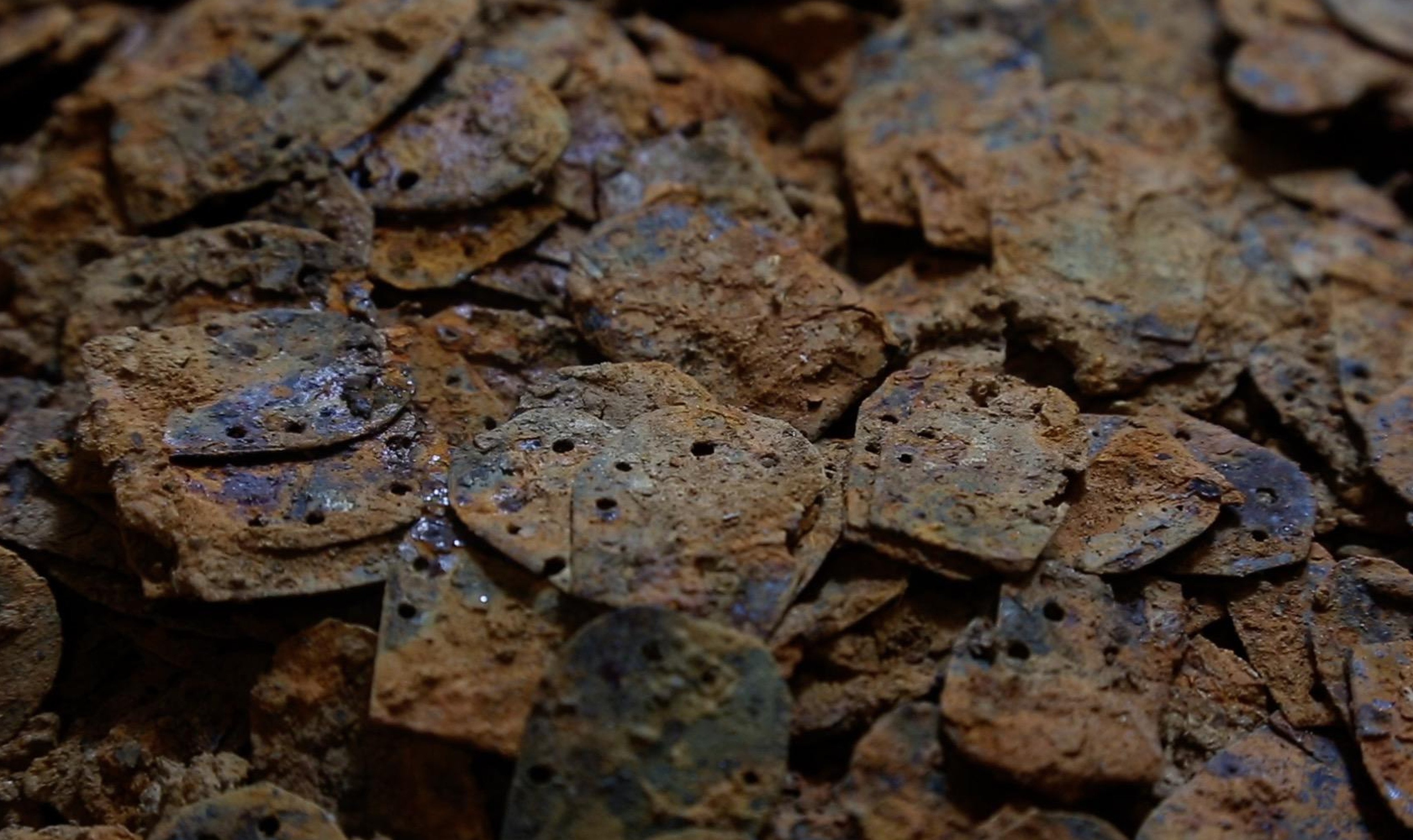 Chinese archaeologists uncovered intricate armour scales from the Han dynasty in Jiangxi. Photo: CCTV