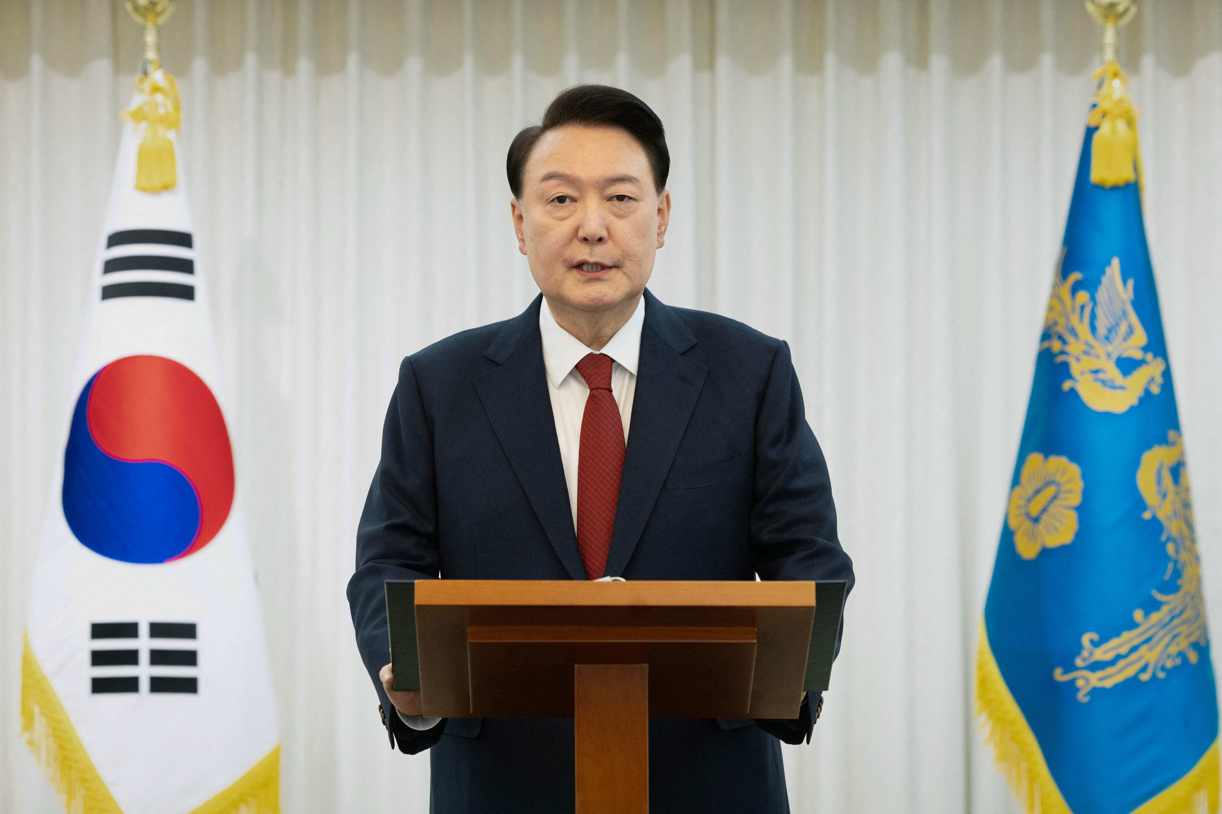 South Korean President Yoon Suk-yeol said he would “step aside” after parliament voted to remove him from office, urging an end to “politics of excess and confrontation”. Photo: South Korean Presidential Office/AFP