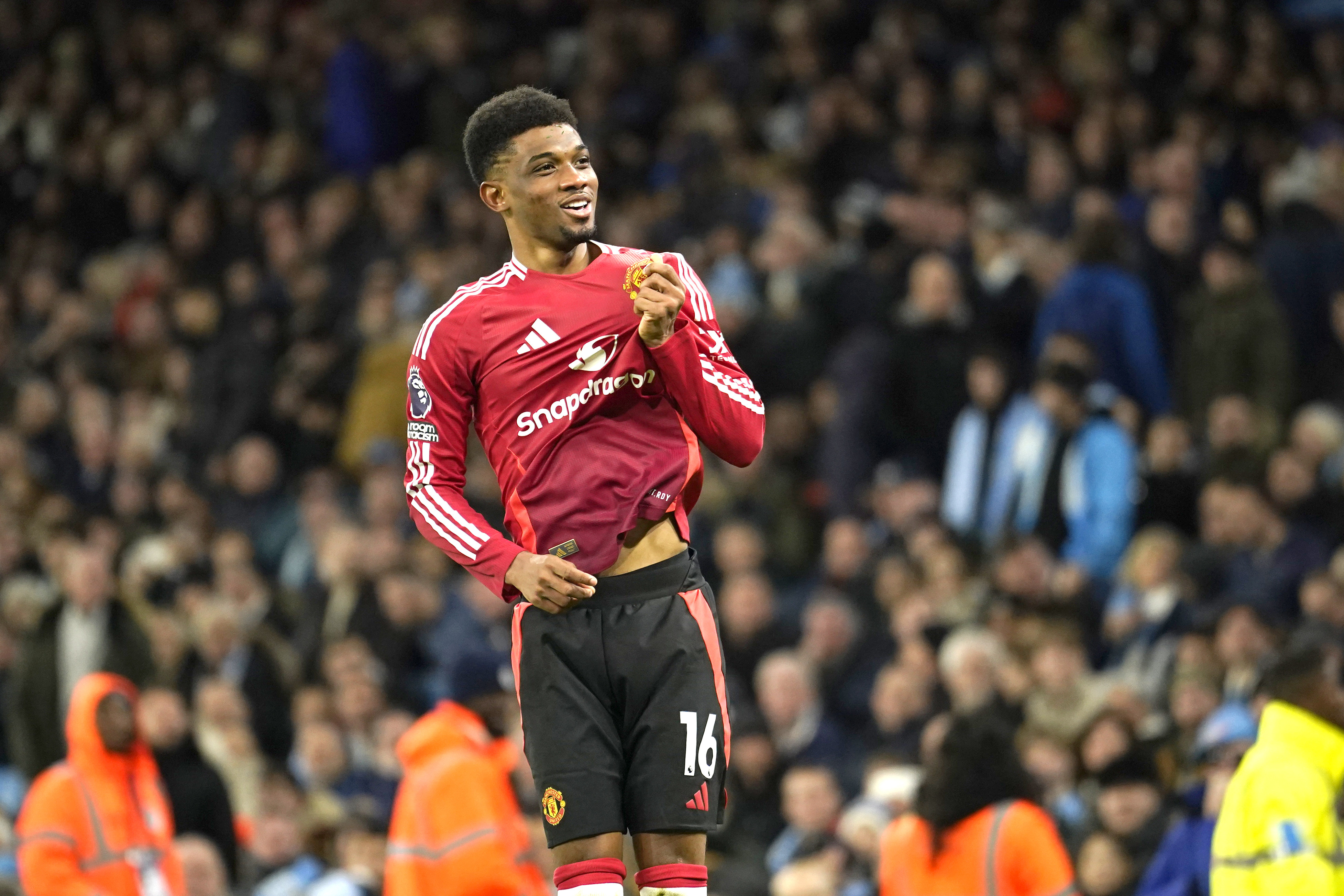 Manchester United winger Amad Diallo celebrates after scoring his side’s last-gasp winner against Manchester City and Manchester United at the Etihad Stadium. Photo: AP