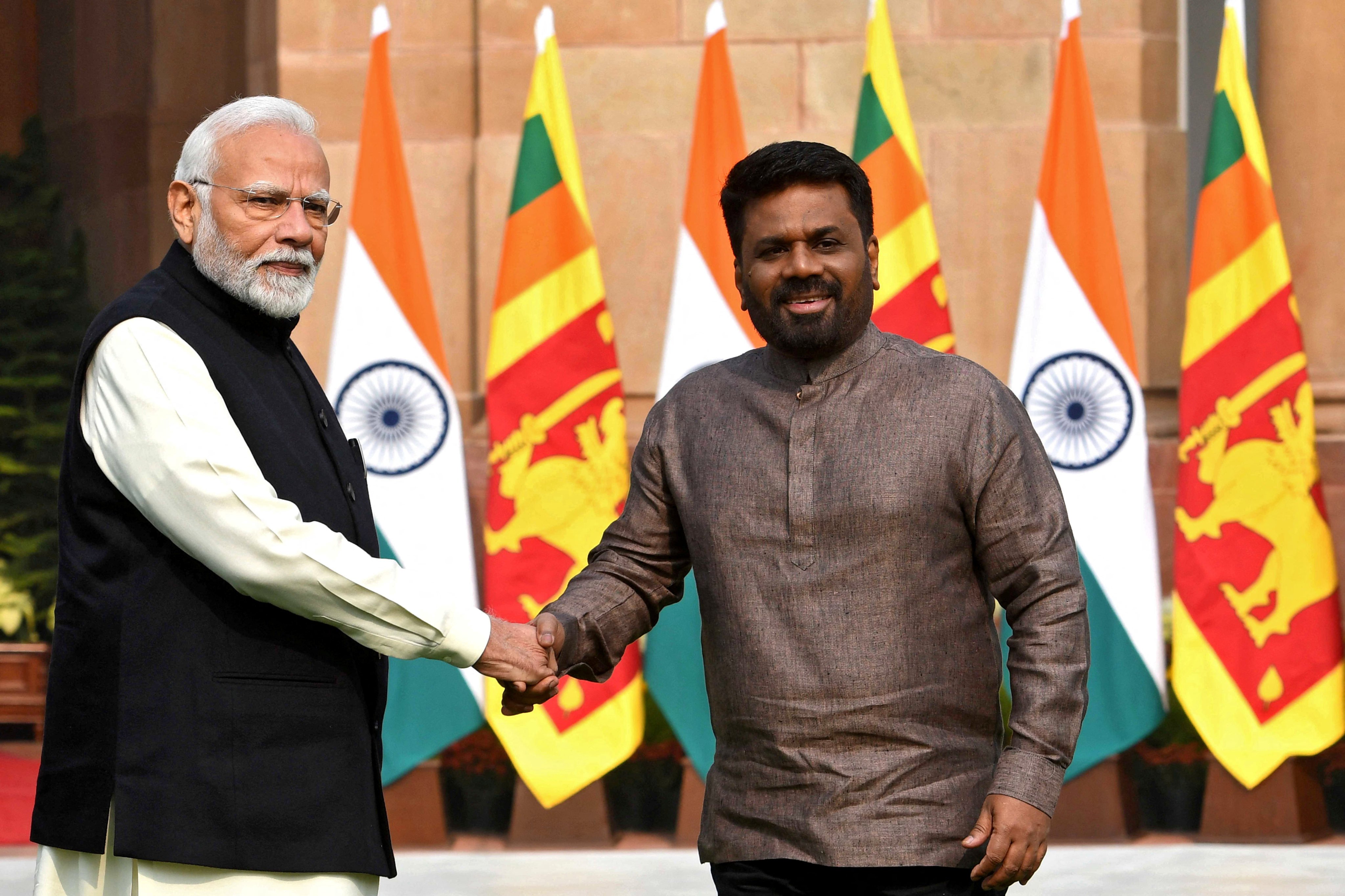 Sri Lanka’s President Anura Kumara Dissanayake and India’s Prime Minister Narendra Modi shake hands ahead of their meeting at Hyderabad House in New Delhi on Monday. Photo: Reuters