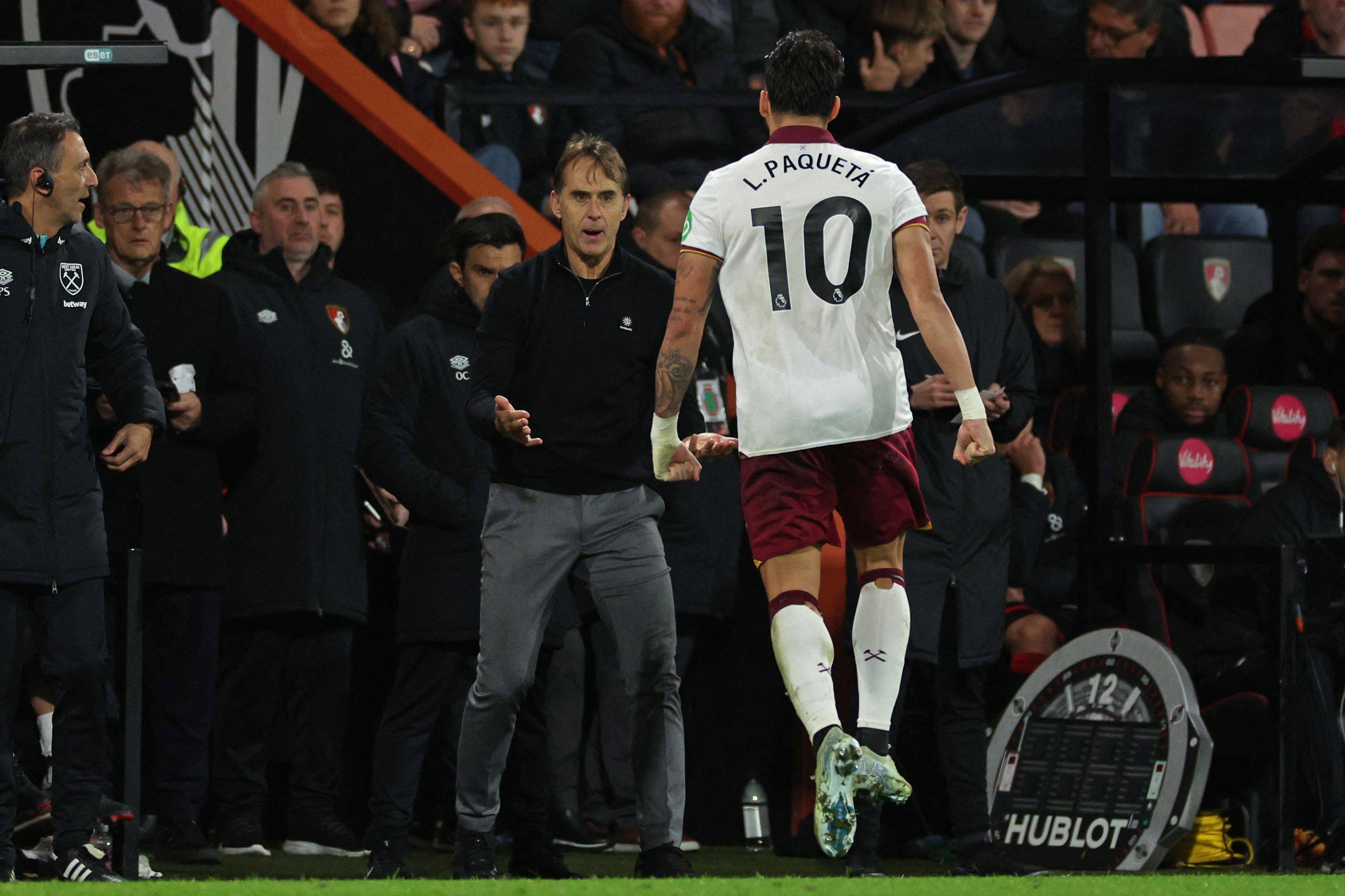 West Ham United’s Lucas Paqueta (right) goes to celebrate with manager Julen Lopetegui after scoring his penalty. Photo: AFP