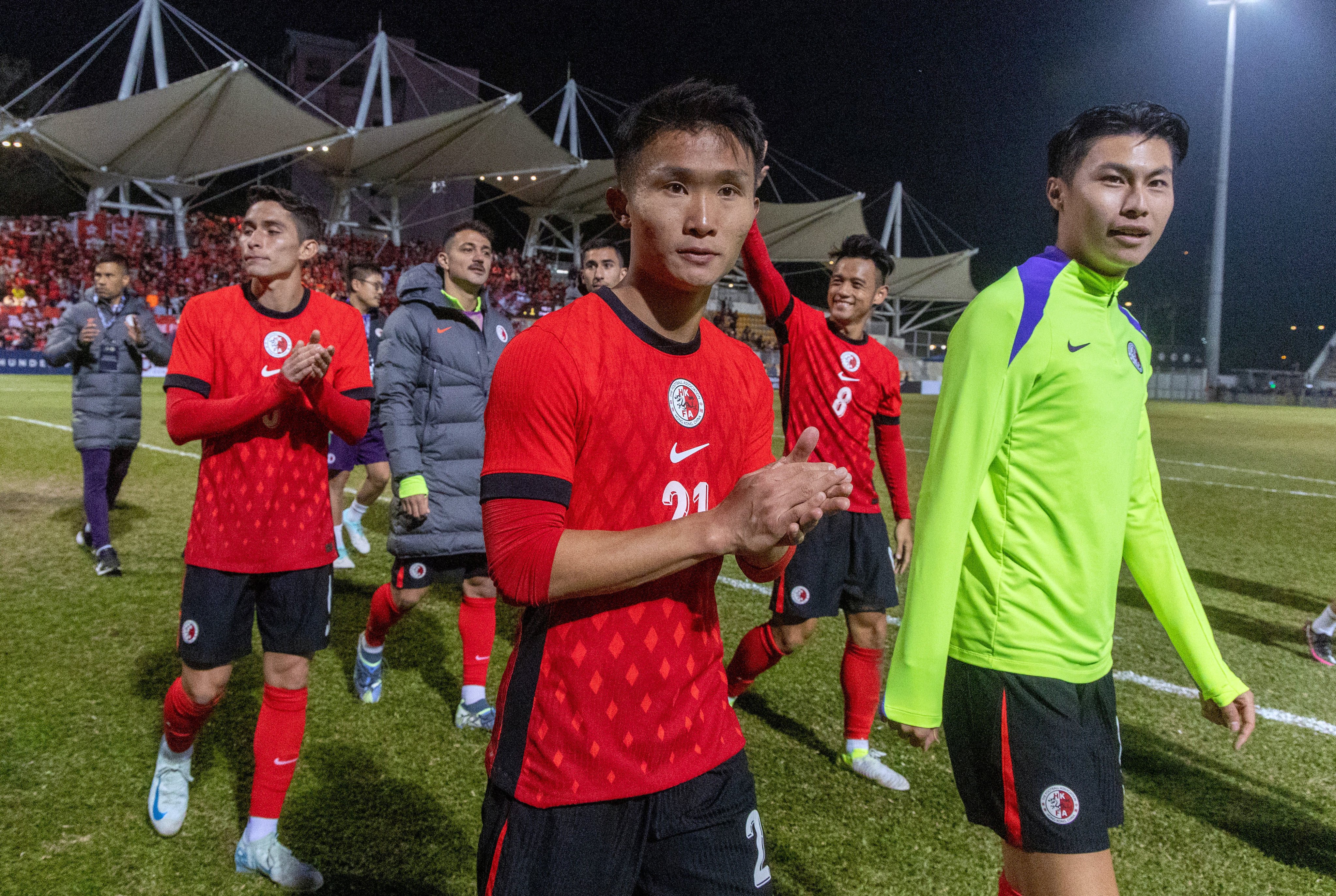 Tsui Wang-kit (centre) chose the most opportune moment to score his first goal for Hong Kong when he popped up at the death against Chinese Taipei on Saturday. Photo: Dickson Lee