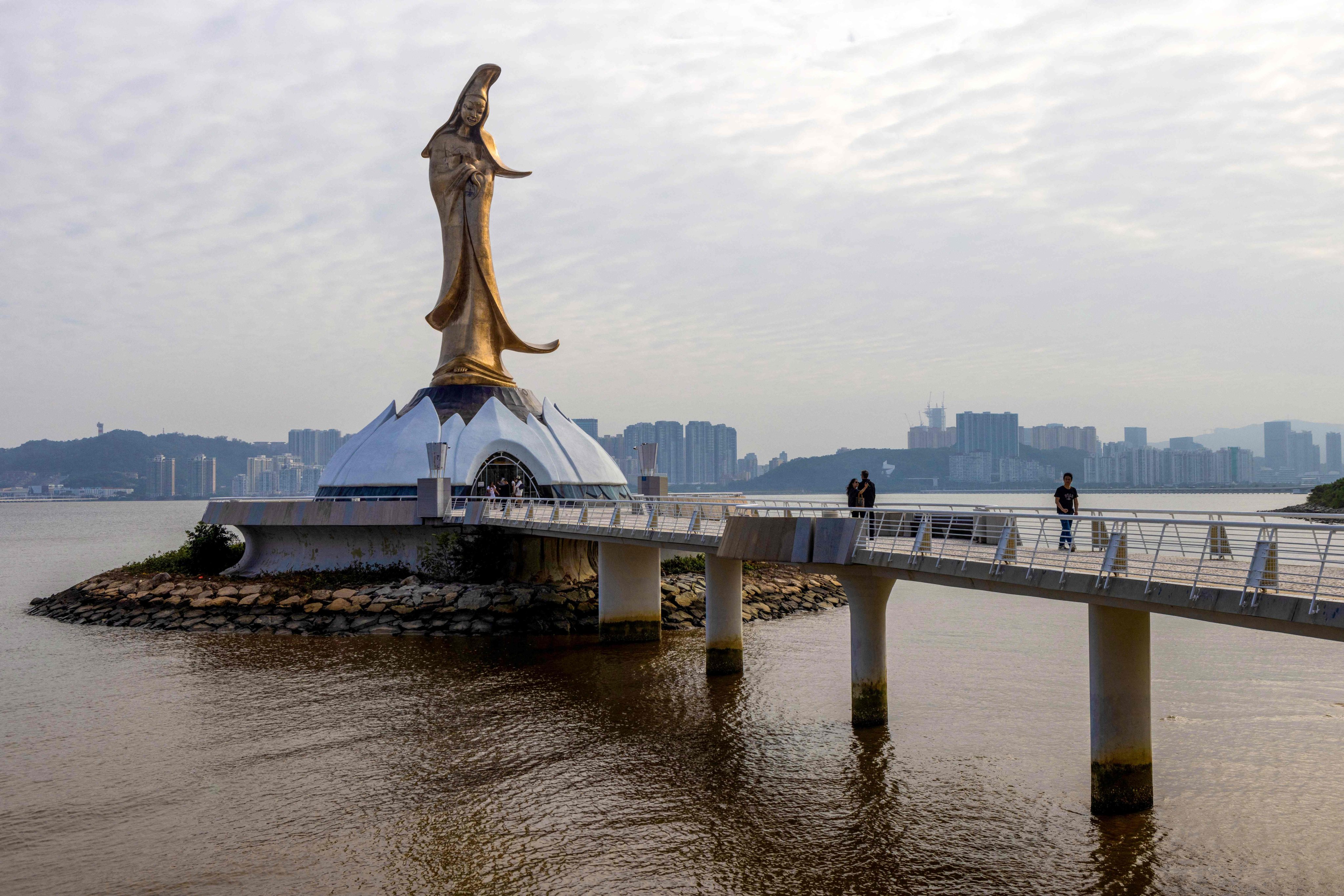 Visitors on the walkway leading to Kun Iam Ecumenical Centre in Macau. Photo: AFP