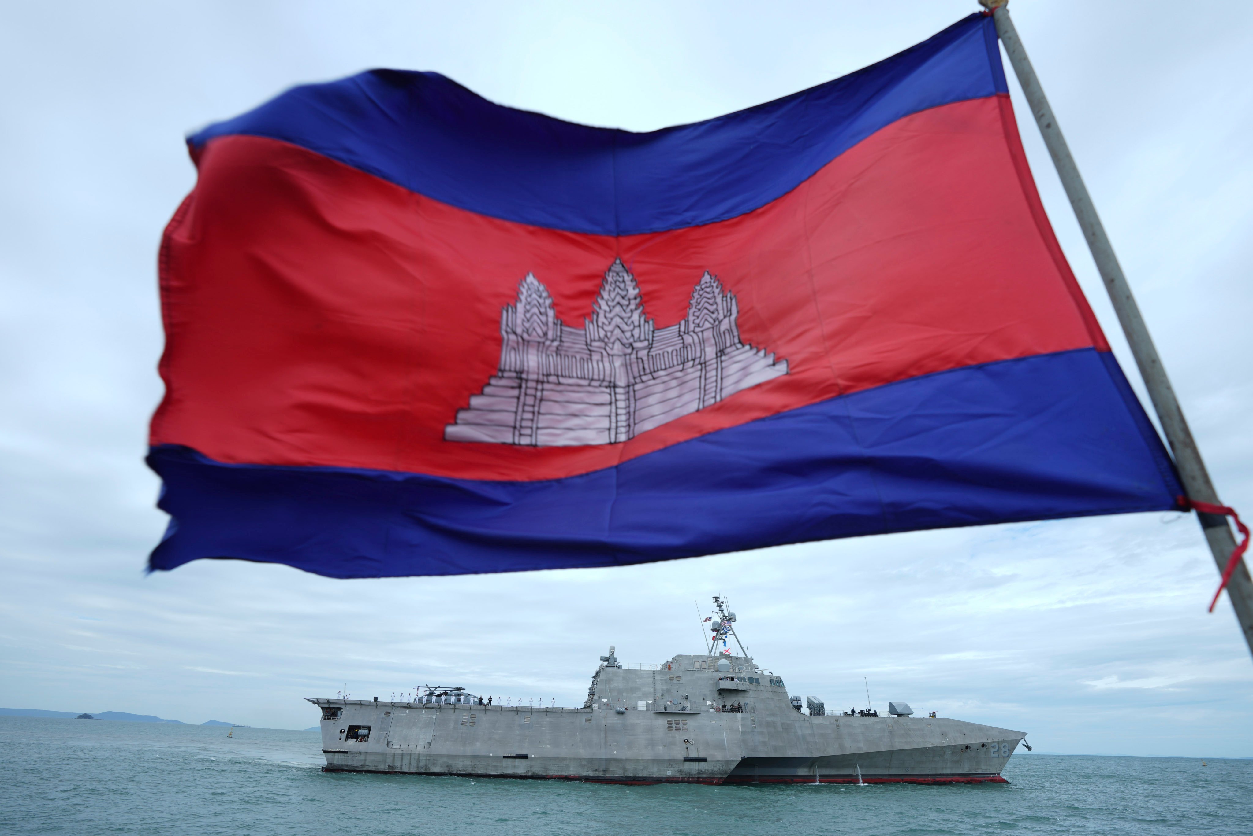 A Cambodian flag flutters as the USS Savannah arrives for a port call at Sihanoukville, Cambodia, on Monday. Photo: AP